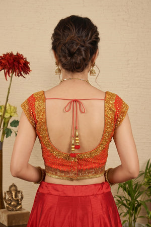 Radiant Coral Orange Banarasi Silk Blouse with Heavy Golden Sequin & Beadwork