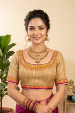 Opulent Golden Plissé Blouse with Jewel Embellishments