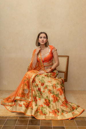 Vibrant Orange Mirror-Work Blouse with Floral Print Silk Lehenga