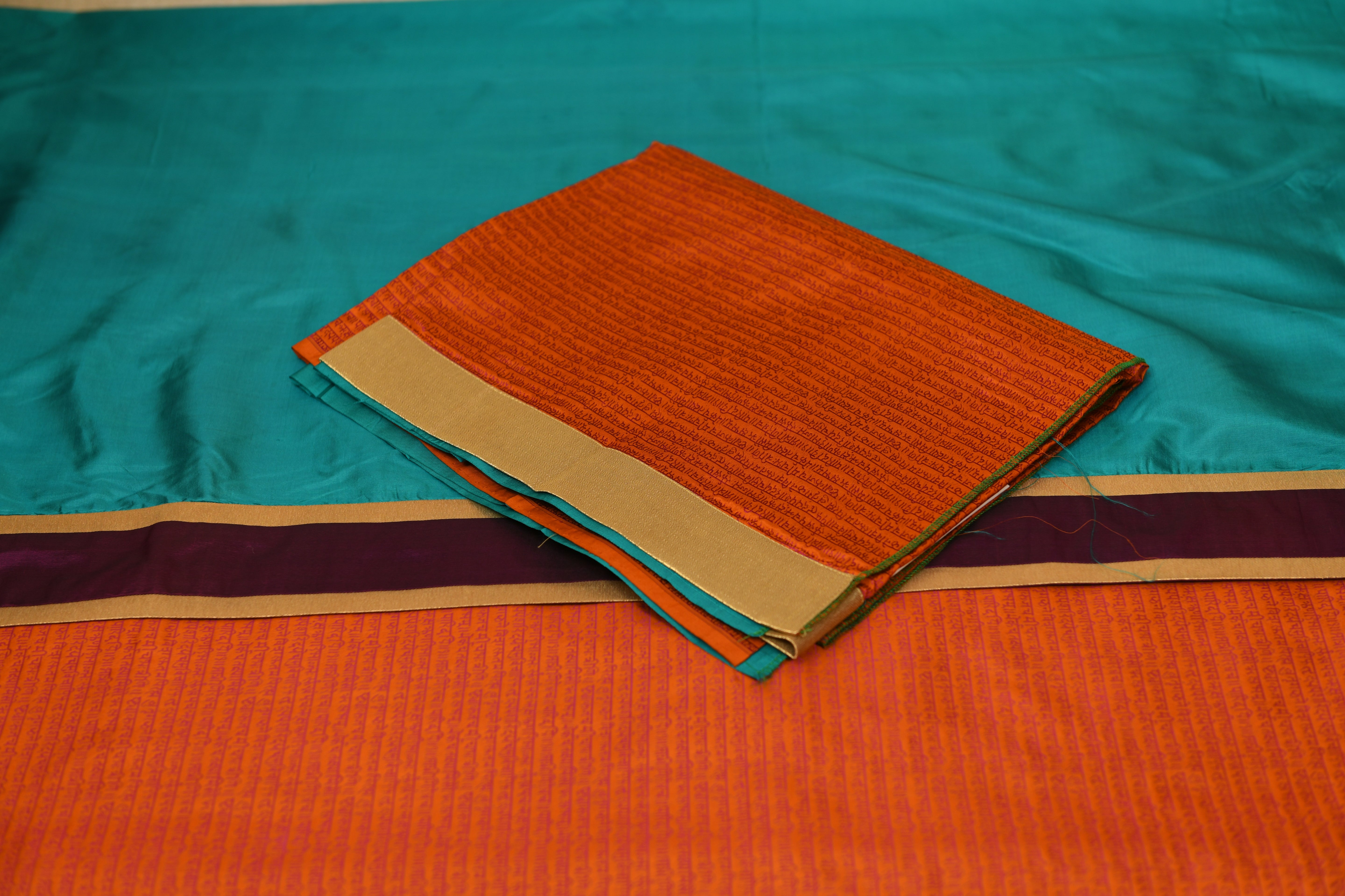 Teal & Rust Dual-Tone Tanchoi Silk Saree with Script Weave