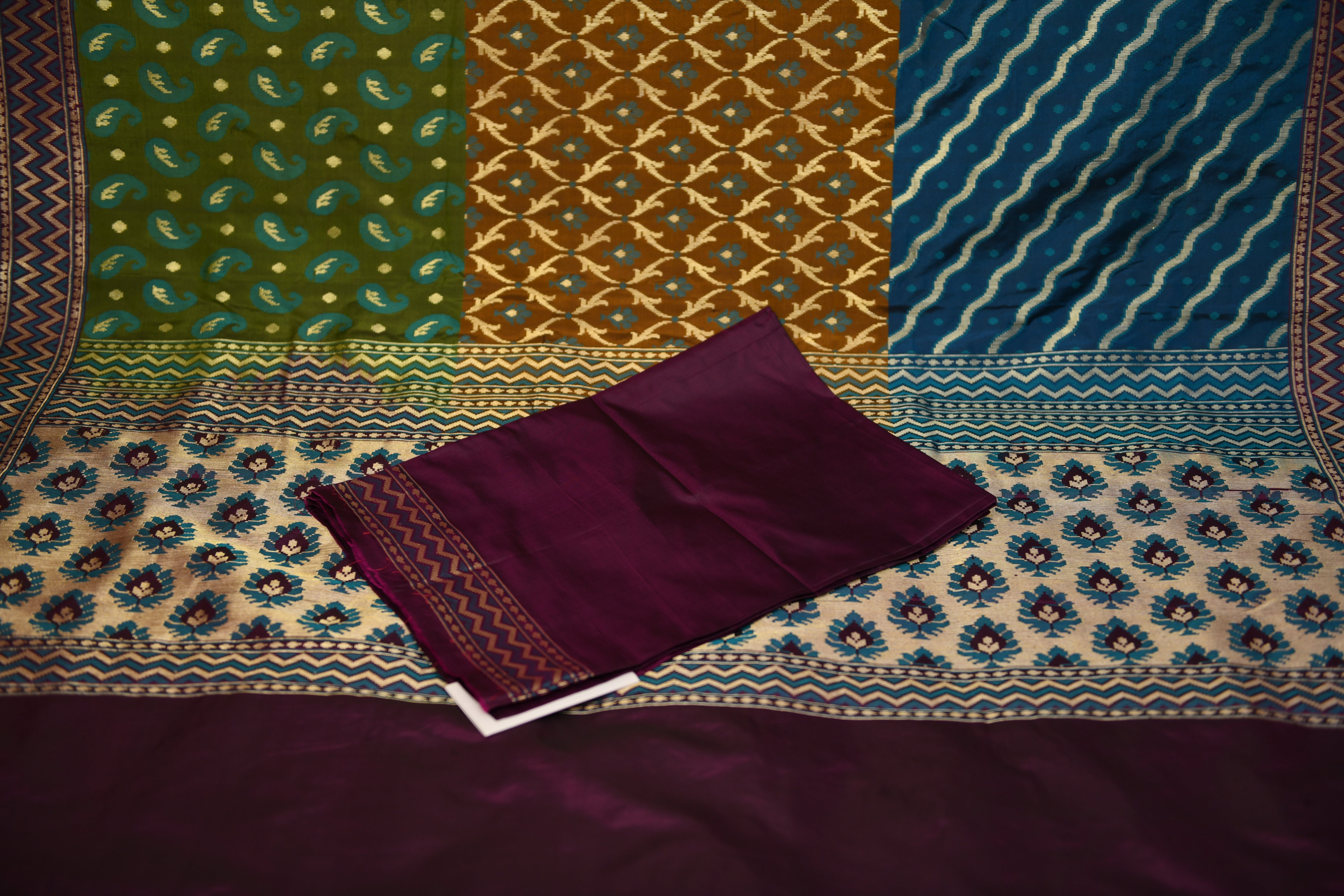 Exquisite Teal & Olive Banarasi Silk Saree with Regal Purple Border