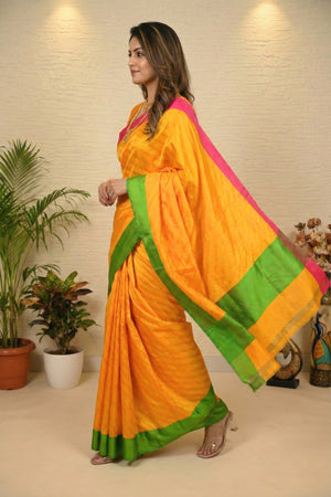 Vibrant Mango Yellow Banarasi Silk Saree with Green & Pink Borders