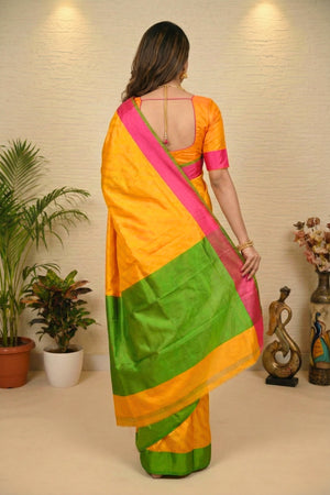 Vibrant Mango Yellow Banarasi Silk Saree with Green & Pink Borders