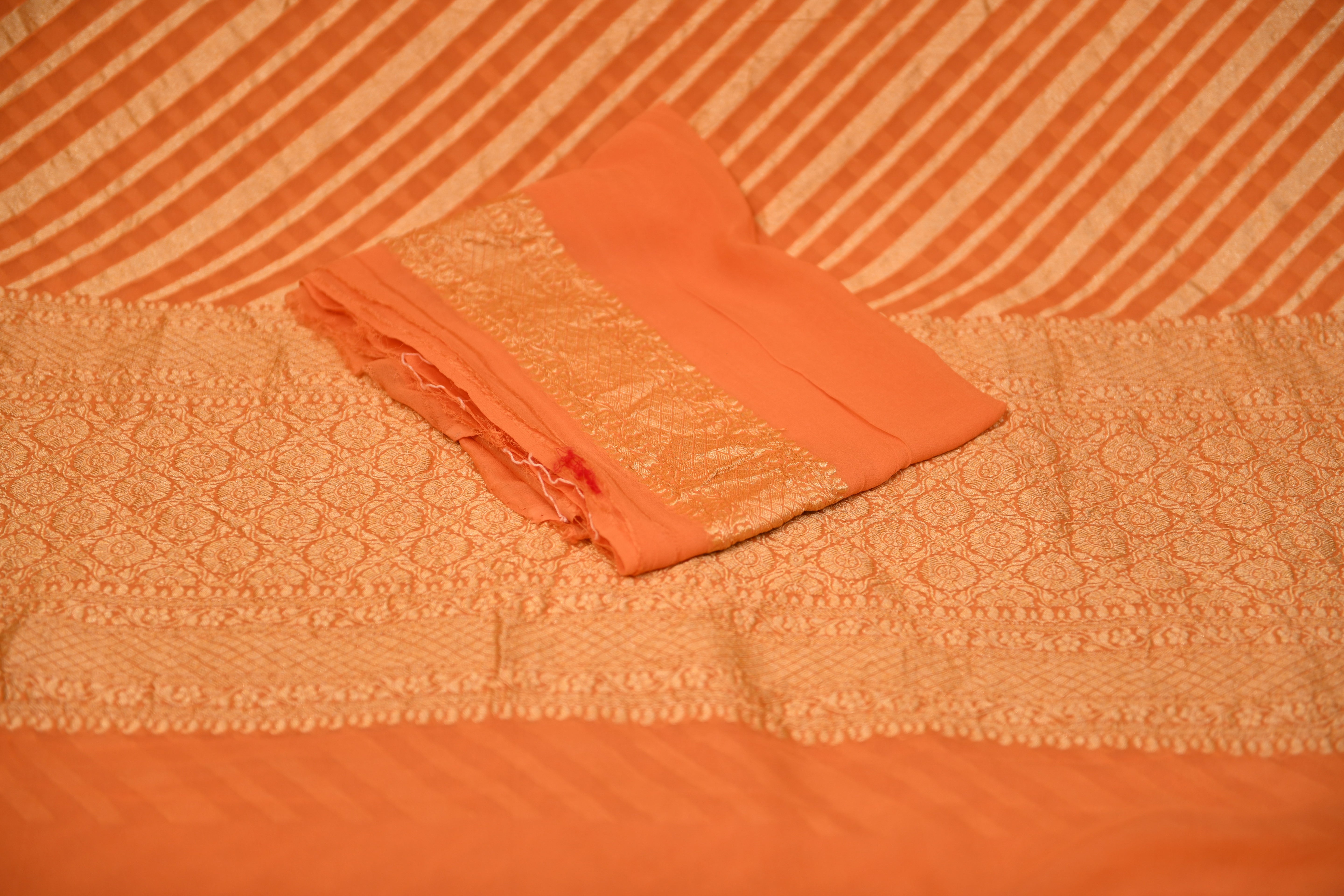 Elegant Peach Leheriya Zari Banarasi Georgette Saree