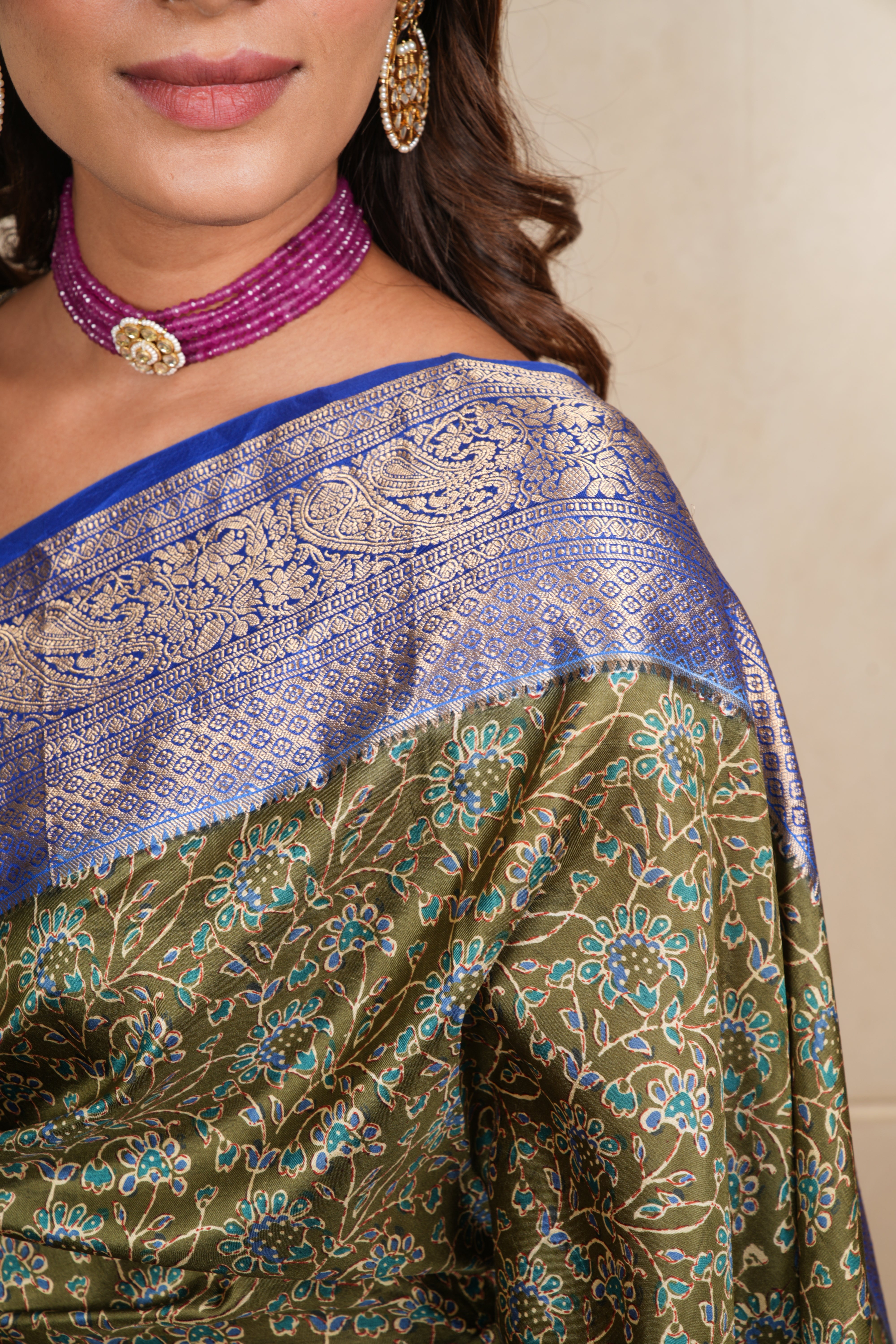 Olive Green Ajrakh Print Soft Silk Saree with Royal Blue Zari Border