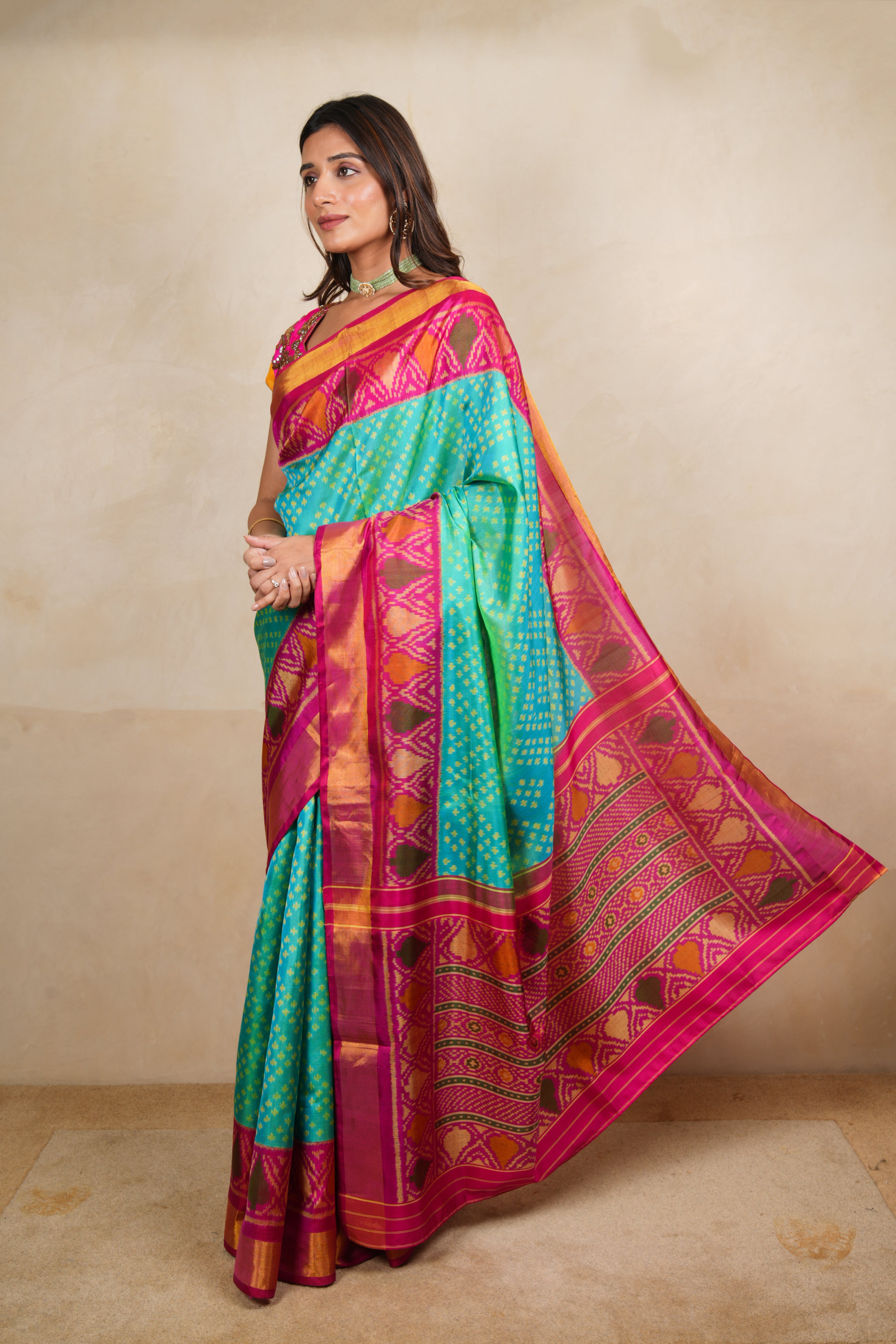 Vibrant Sea Green & Pink Patola Silk Saree