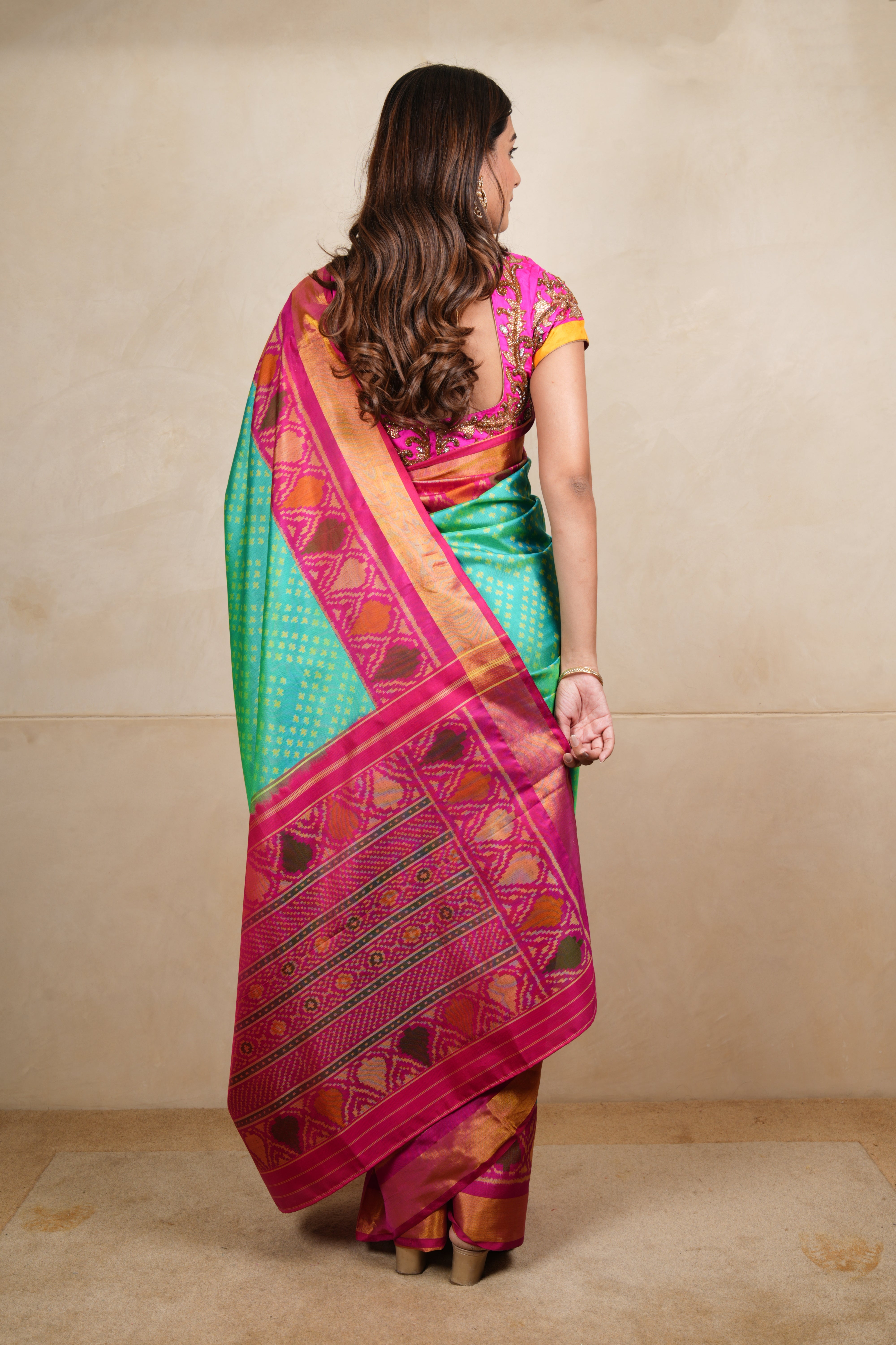 Vibrant Sea Green & Pink Patola Silk Saree