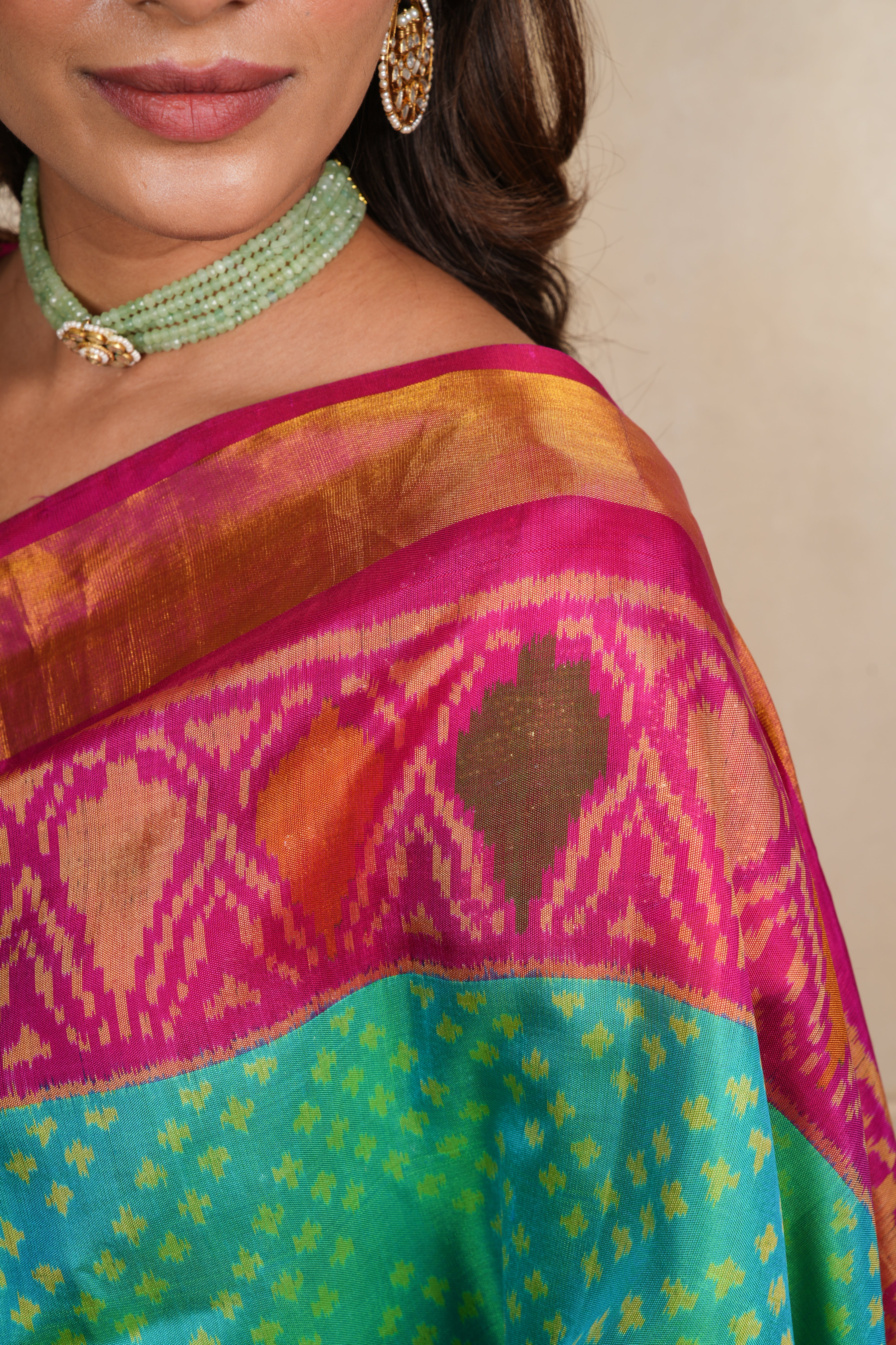 Vibrant Sea Green & Pink Patola Silk Saree
