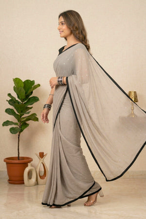 Dove Grey Georgette Saree with Sleek Black Border & Stitched Blouse
