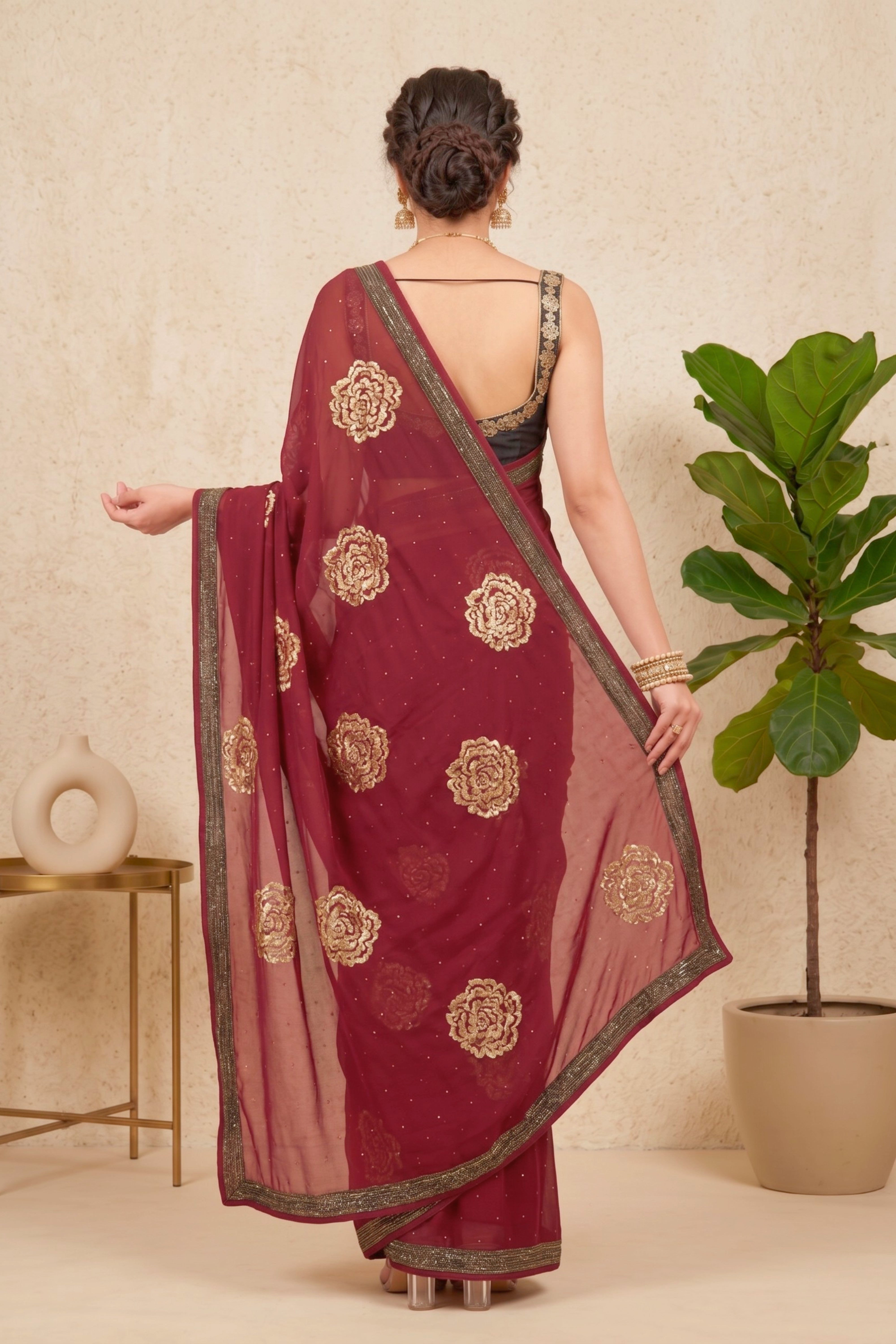 Elegant Maroon Georgette Saree with Golden Floral Motifs