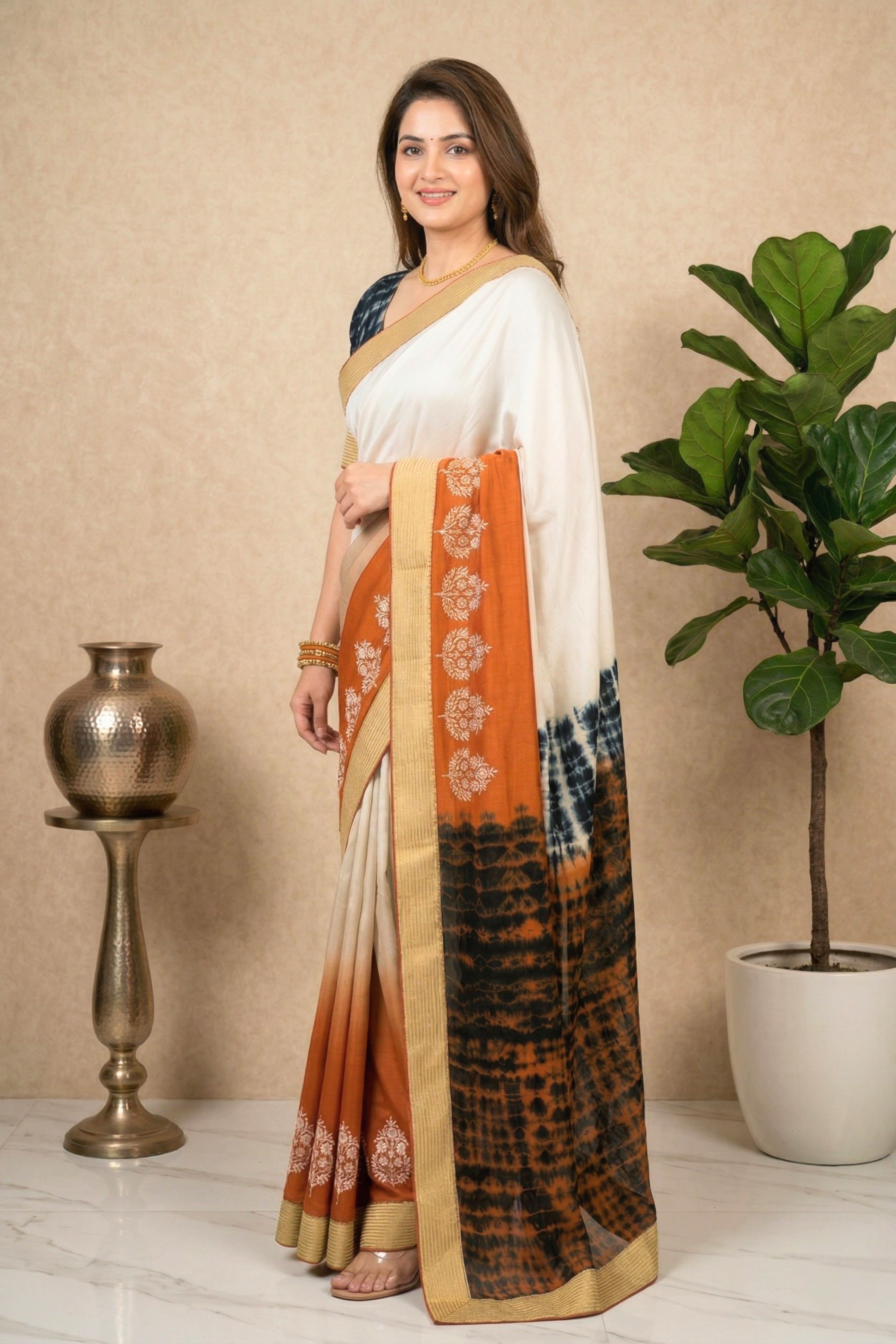 Contemporary Off-White and Rust Georgette Saree with Shibori Pallu
