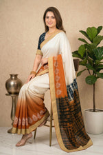 Contemporary Off-White and Rust Georgette Saree with Shibori Pallu