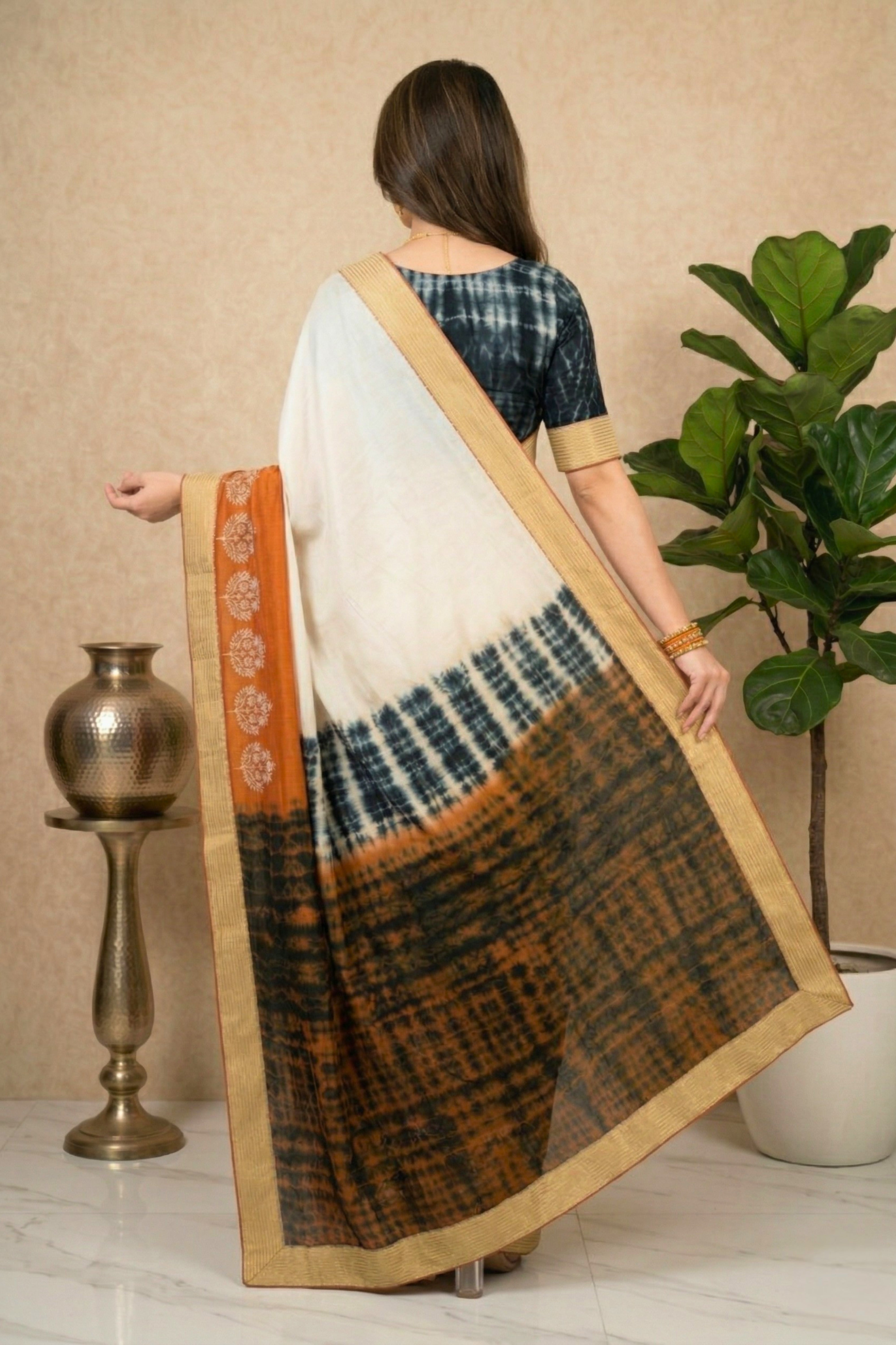 Contemporary Off-White and Rust Georgette Saree with Shibori Pallu