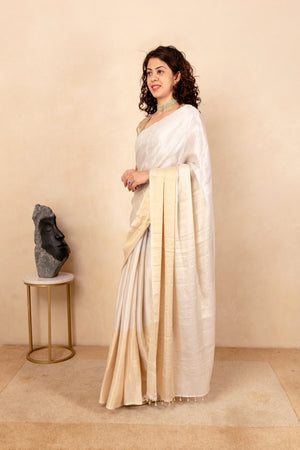 Ethereal White & Gold Soft Tissue Saree with Tassel Detailing