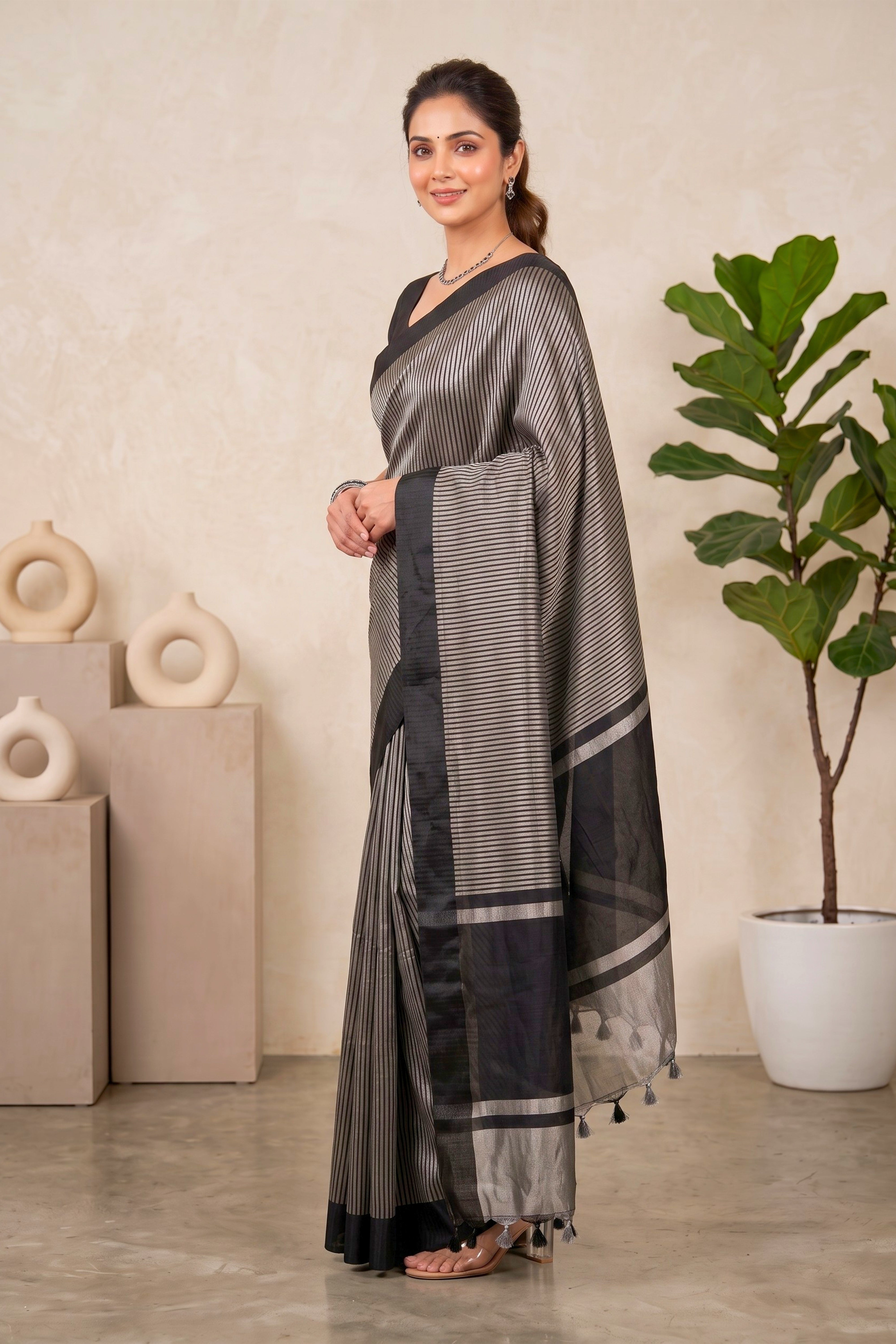 Celebrity-Inspired Black & Silver Striped Tissue Saree