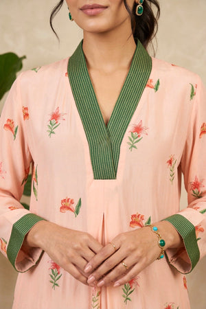 Elegant Peach Floral Printed Crepe Kurti with Contrast Green Neckline