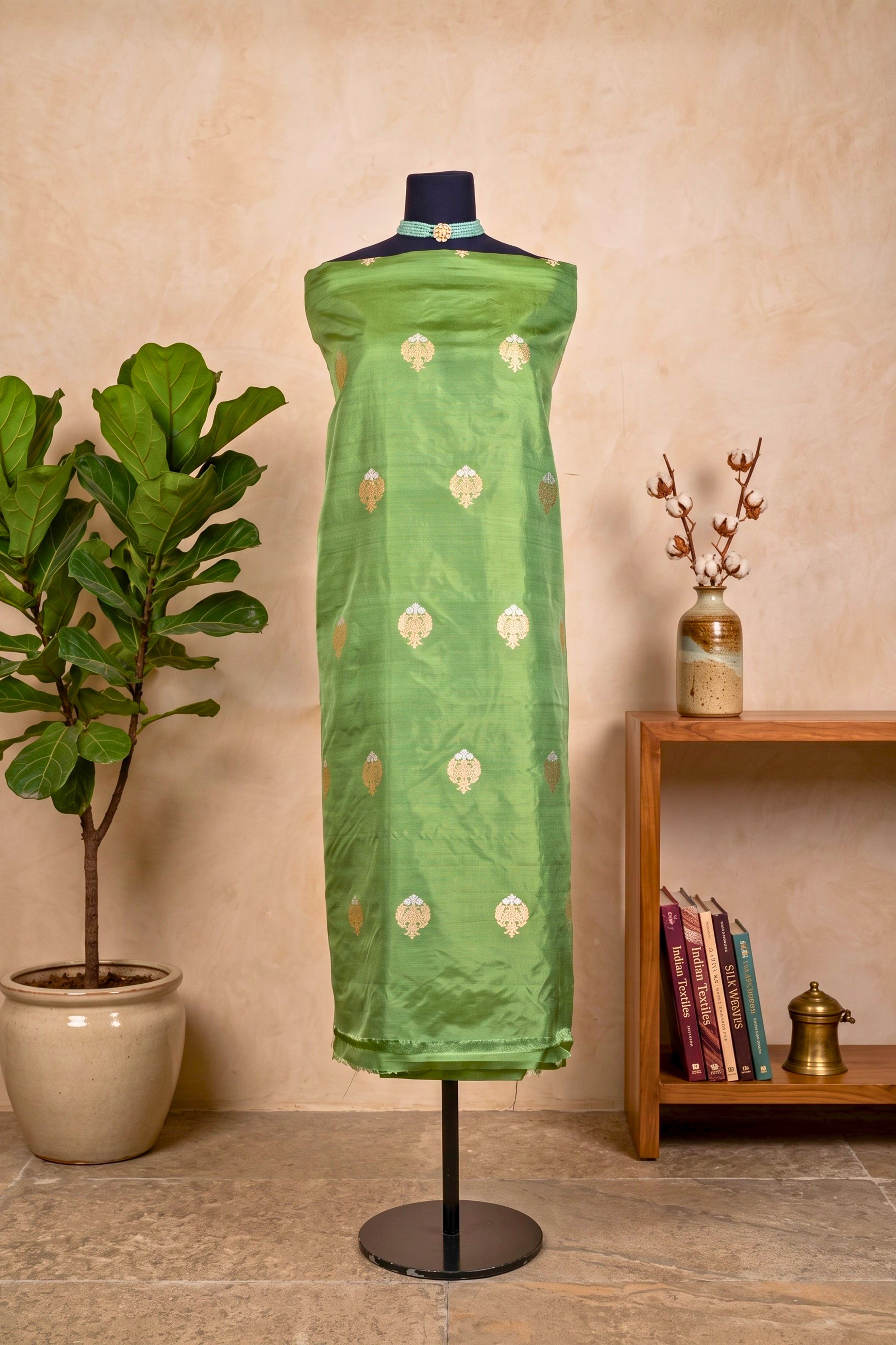 Elegant Mehendi Green Banarasi Silk Unstitched Dress Material