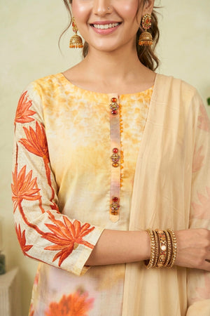 Vibrant Pale Yellow Cotton Suit Set with Orange Lotus Motifs & Jeweled Placket