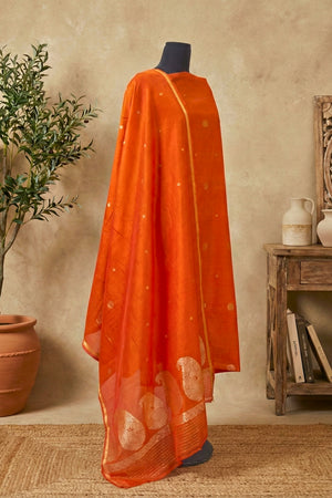 Tangerine Orange Chiniya Silk Unstitched Suit Set with Zari Woven Dupatta by Label Tamanna