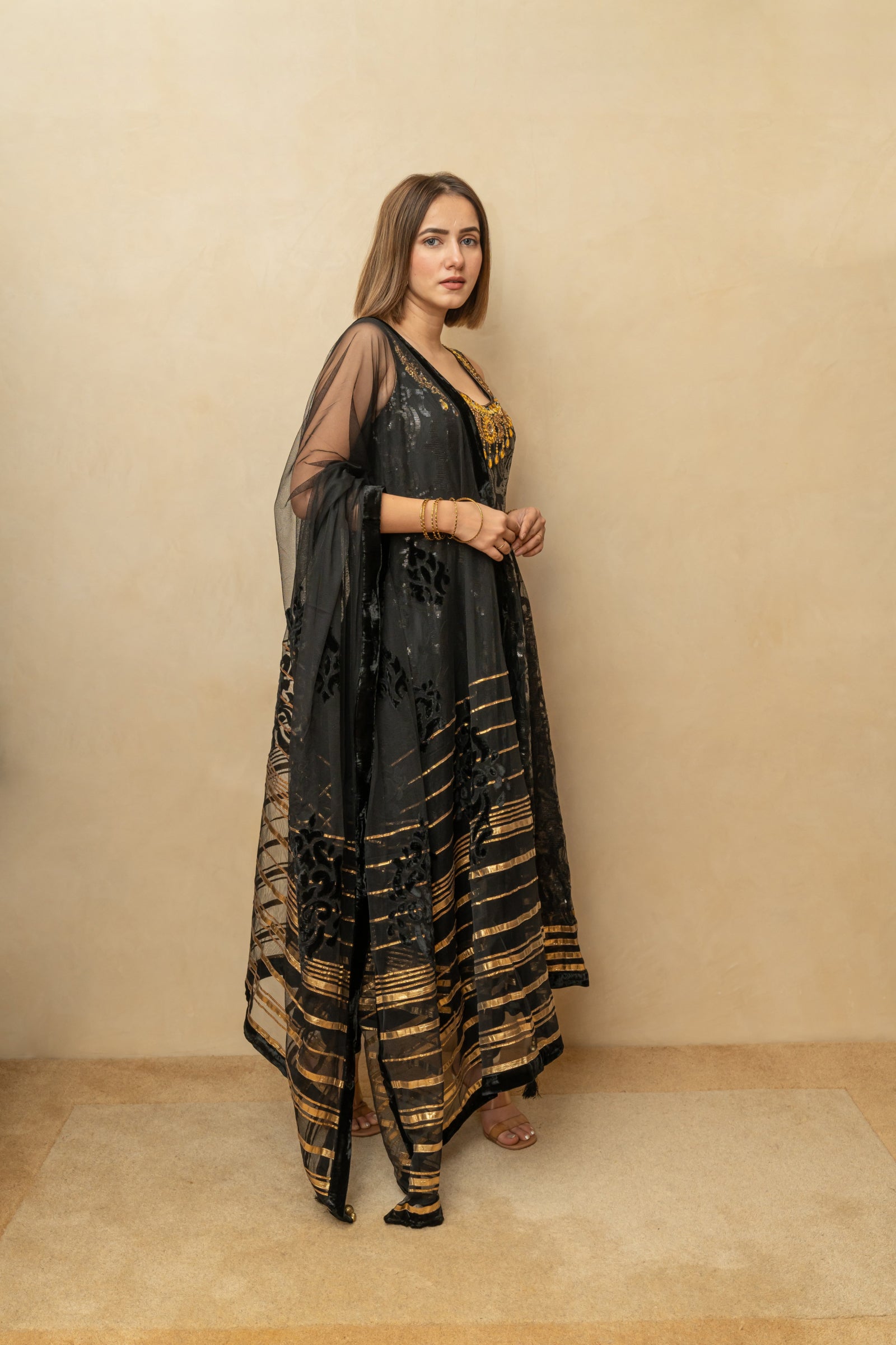Black and gold self sequence work anarkali suit set