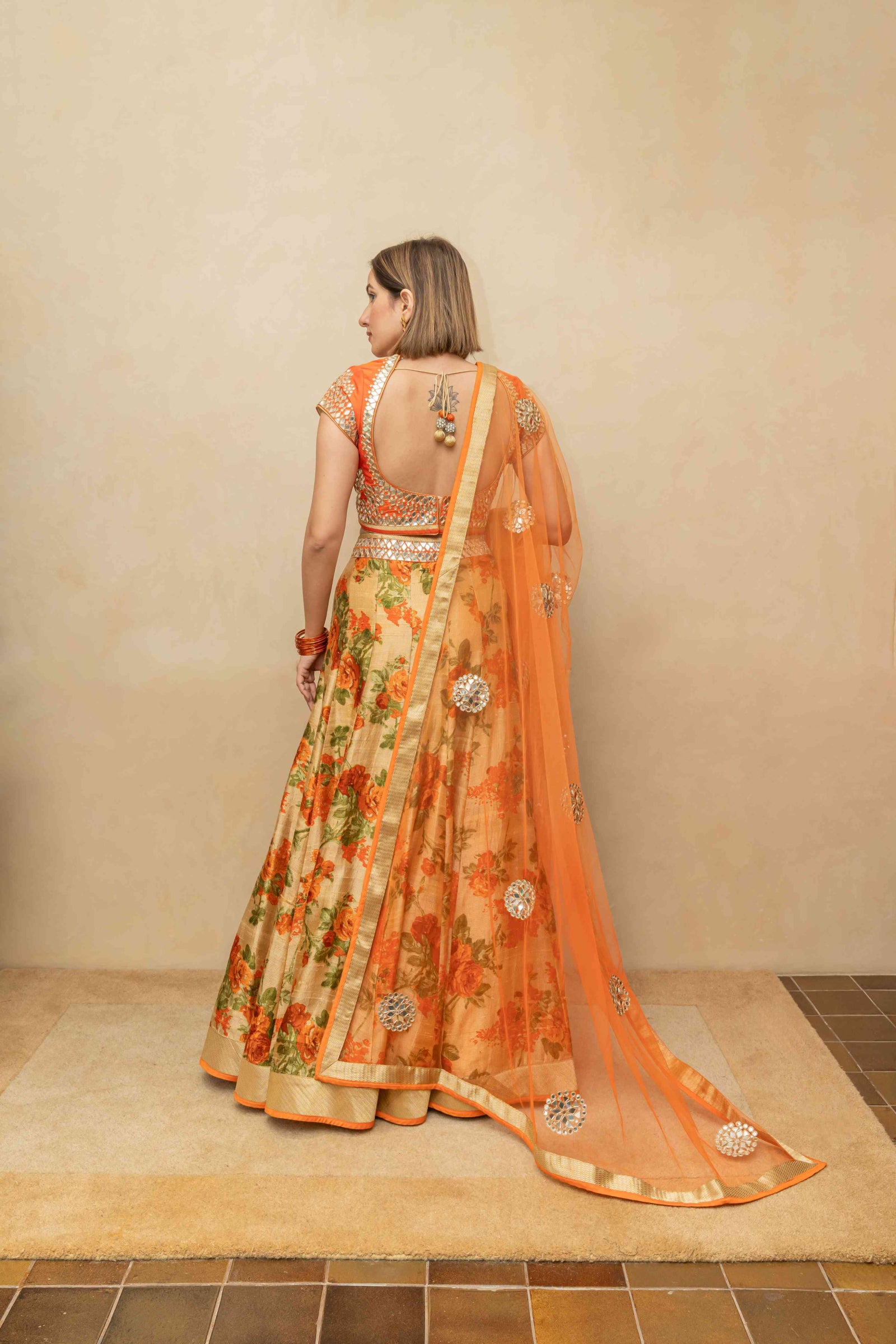 Orange floral and mirror lehenga