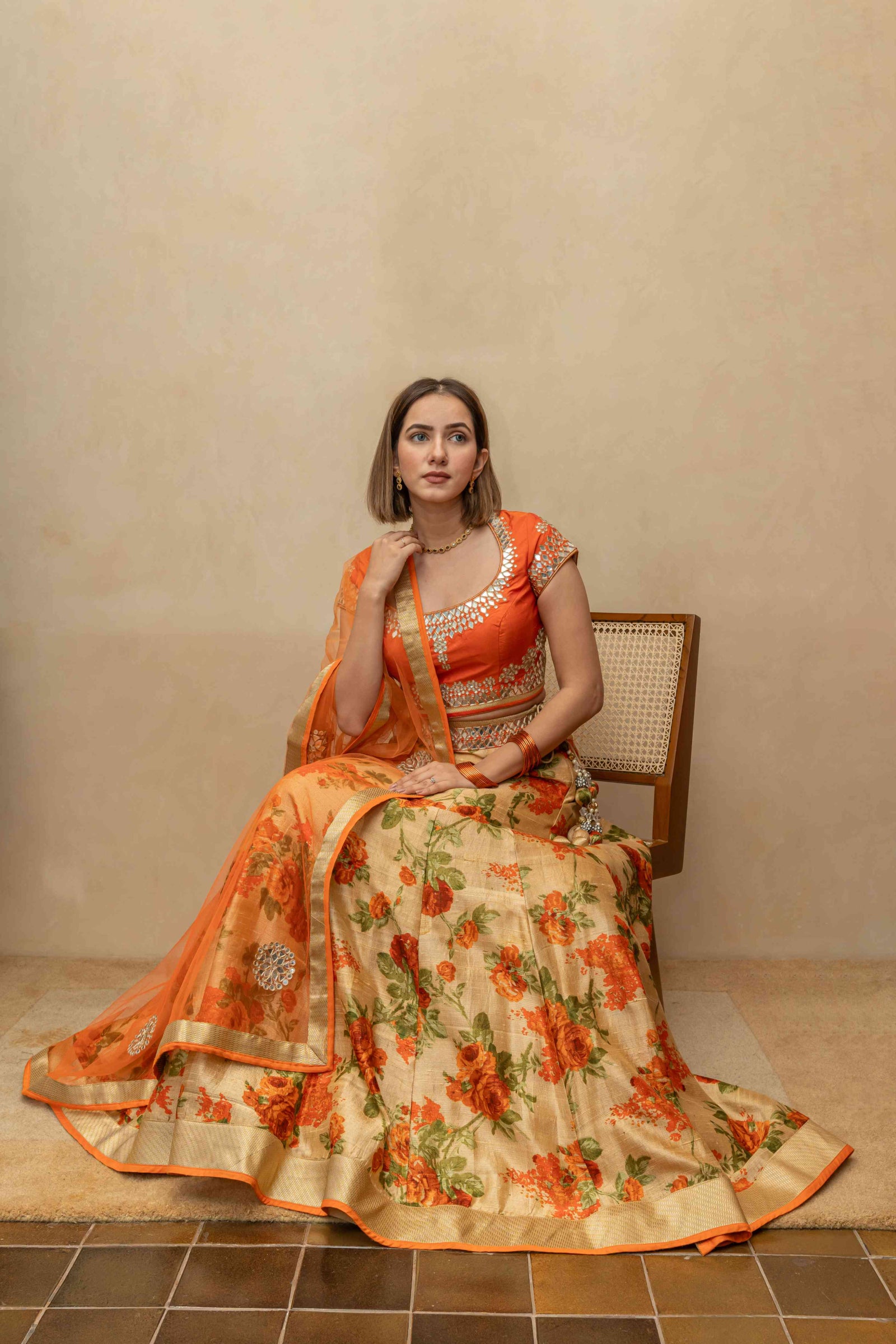 Orange floral and mirror lehenga