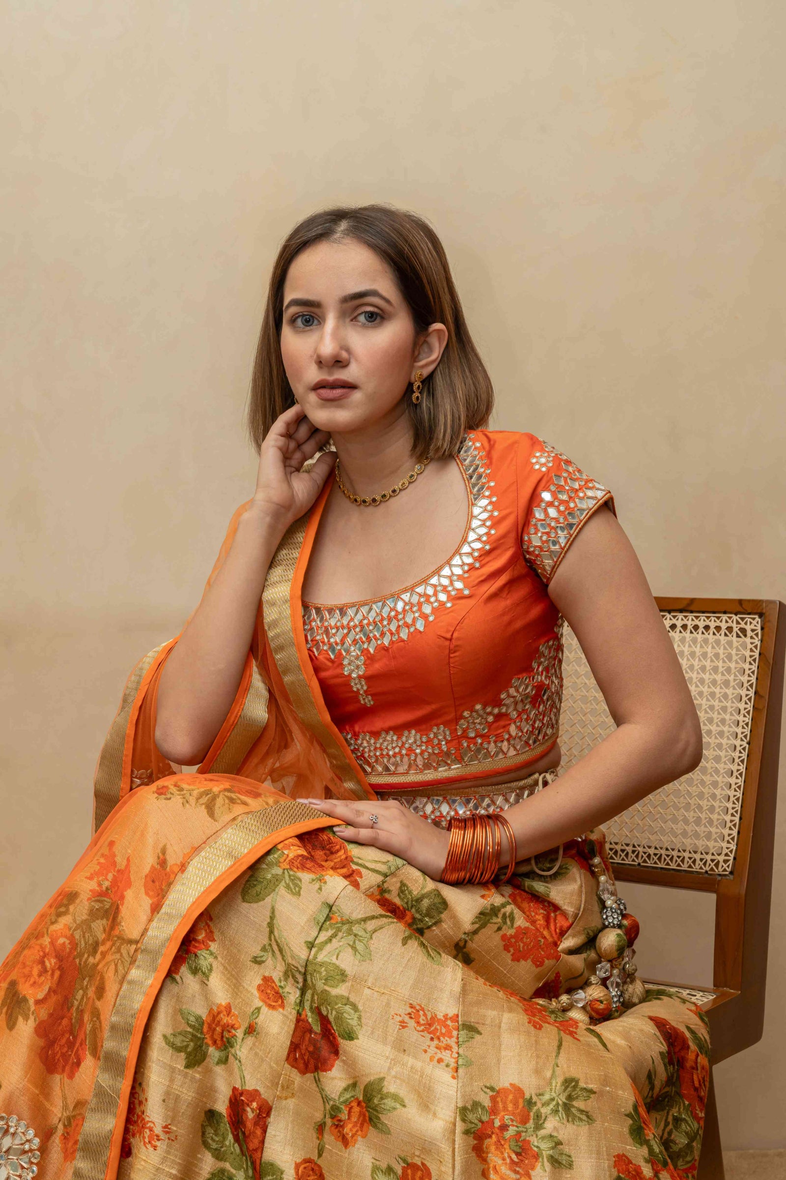 Orange floral and mirror lehenga