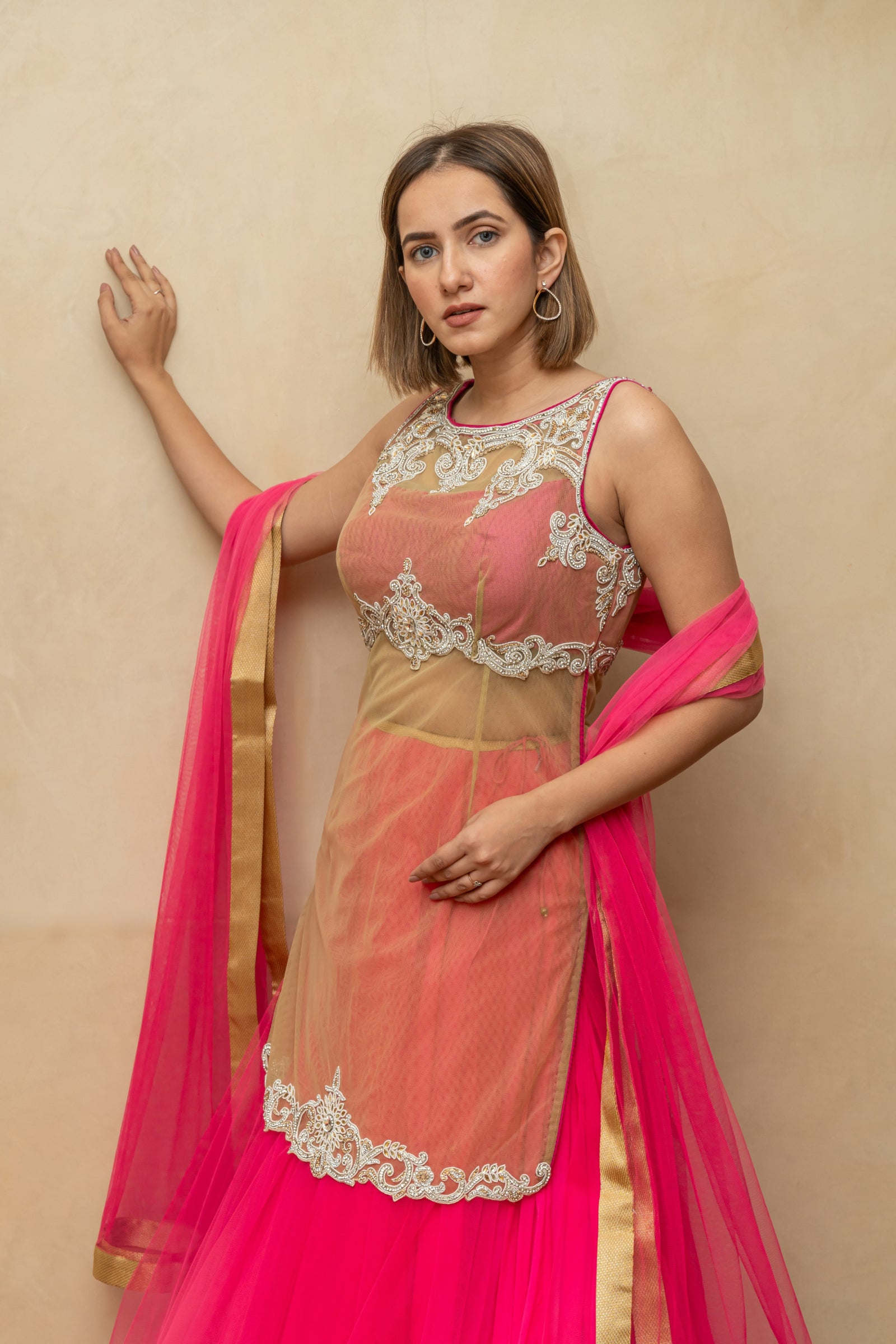 Hot pink and gold long blouse sheer lehenga set