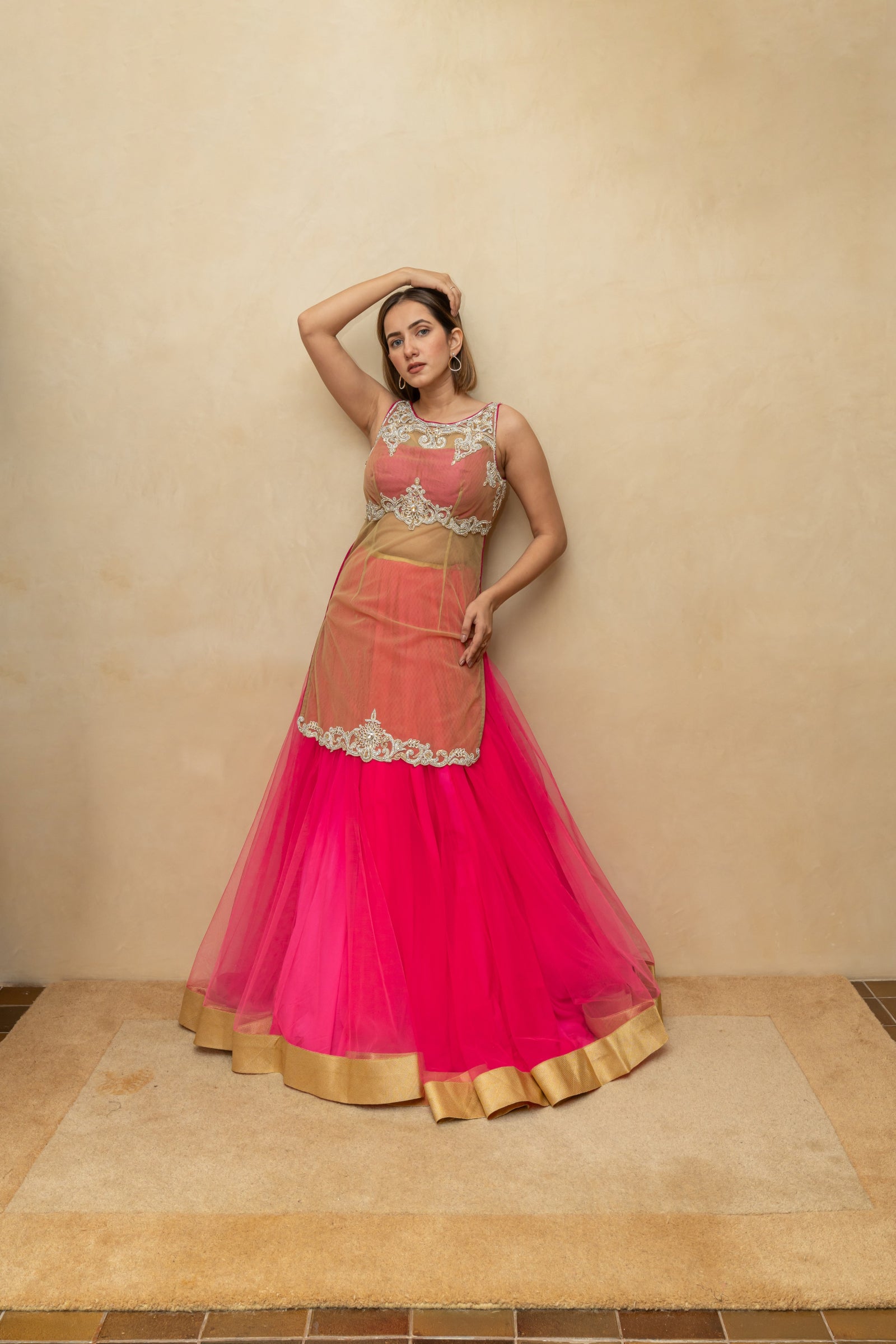 Hot pink and gold long blouse sheer lehenga set