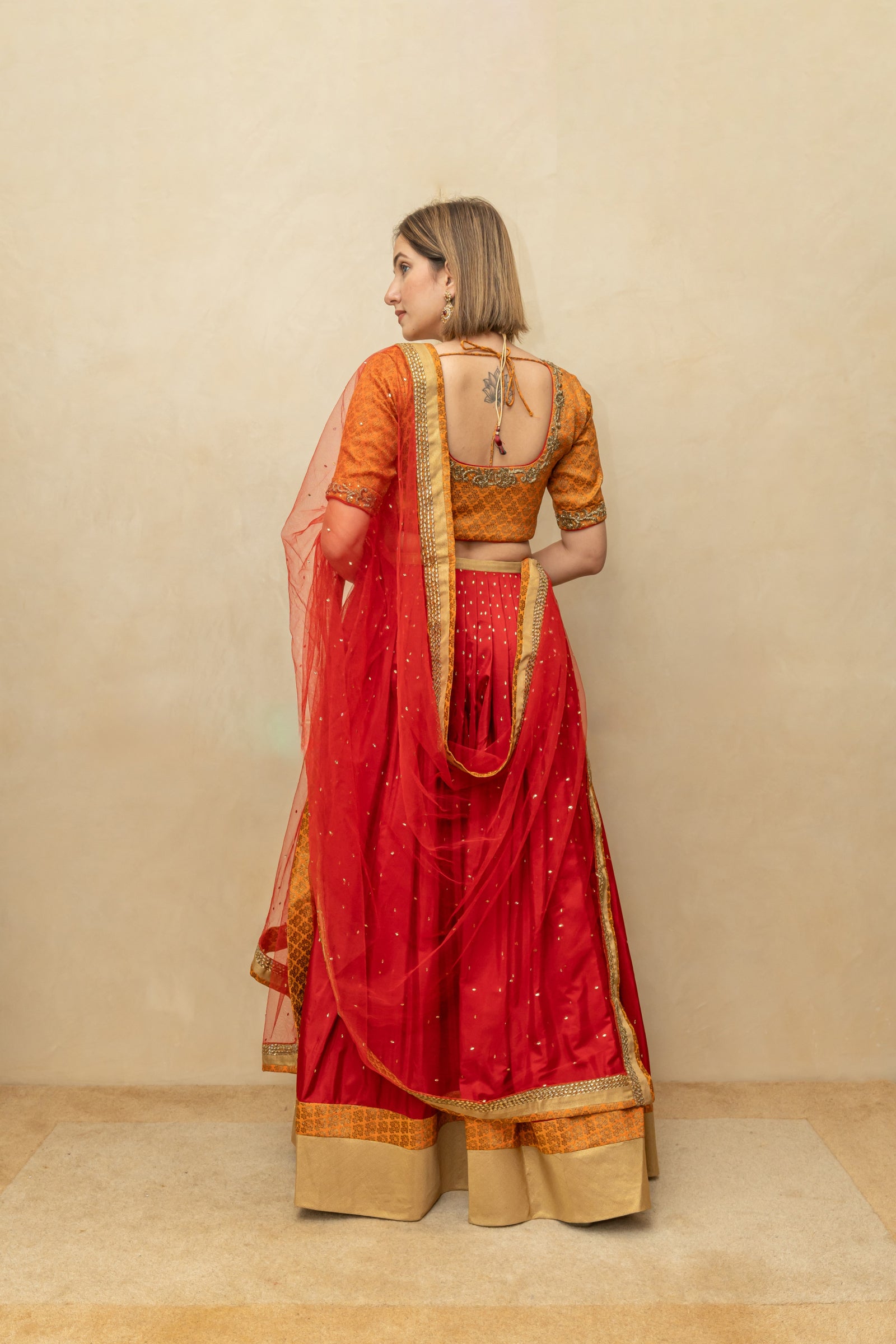 Orange and red silk lehenga set