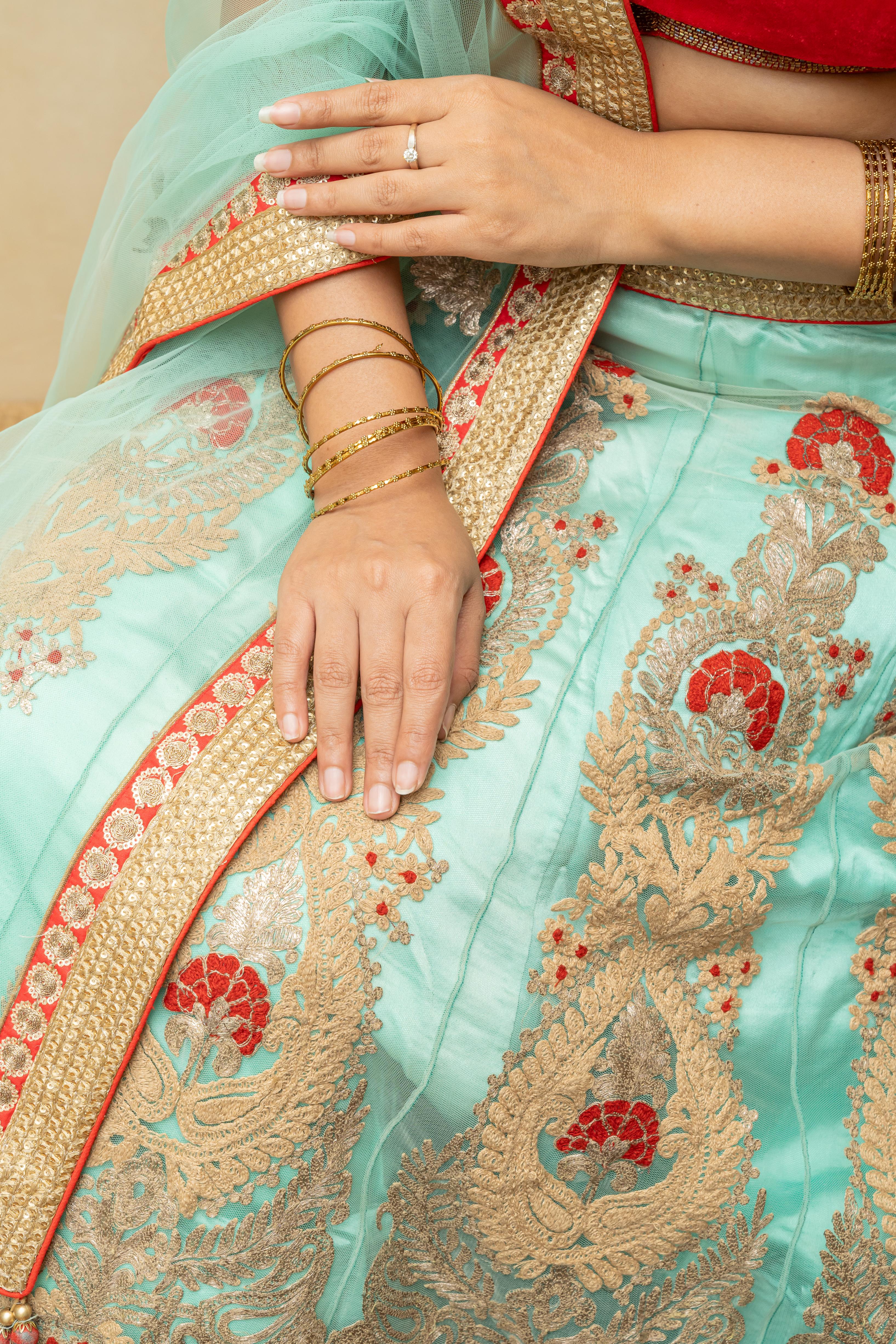 Rich turquoise blue and red threadwork lehenga set