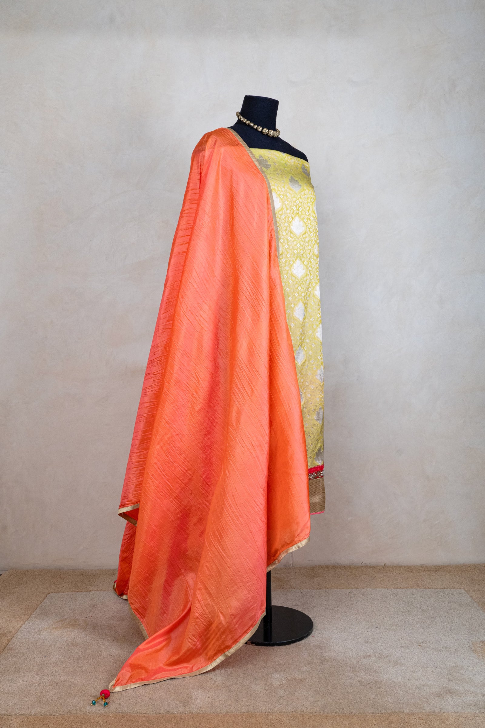 Parrot green and orange banarasi silk suit set