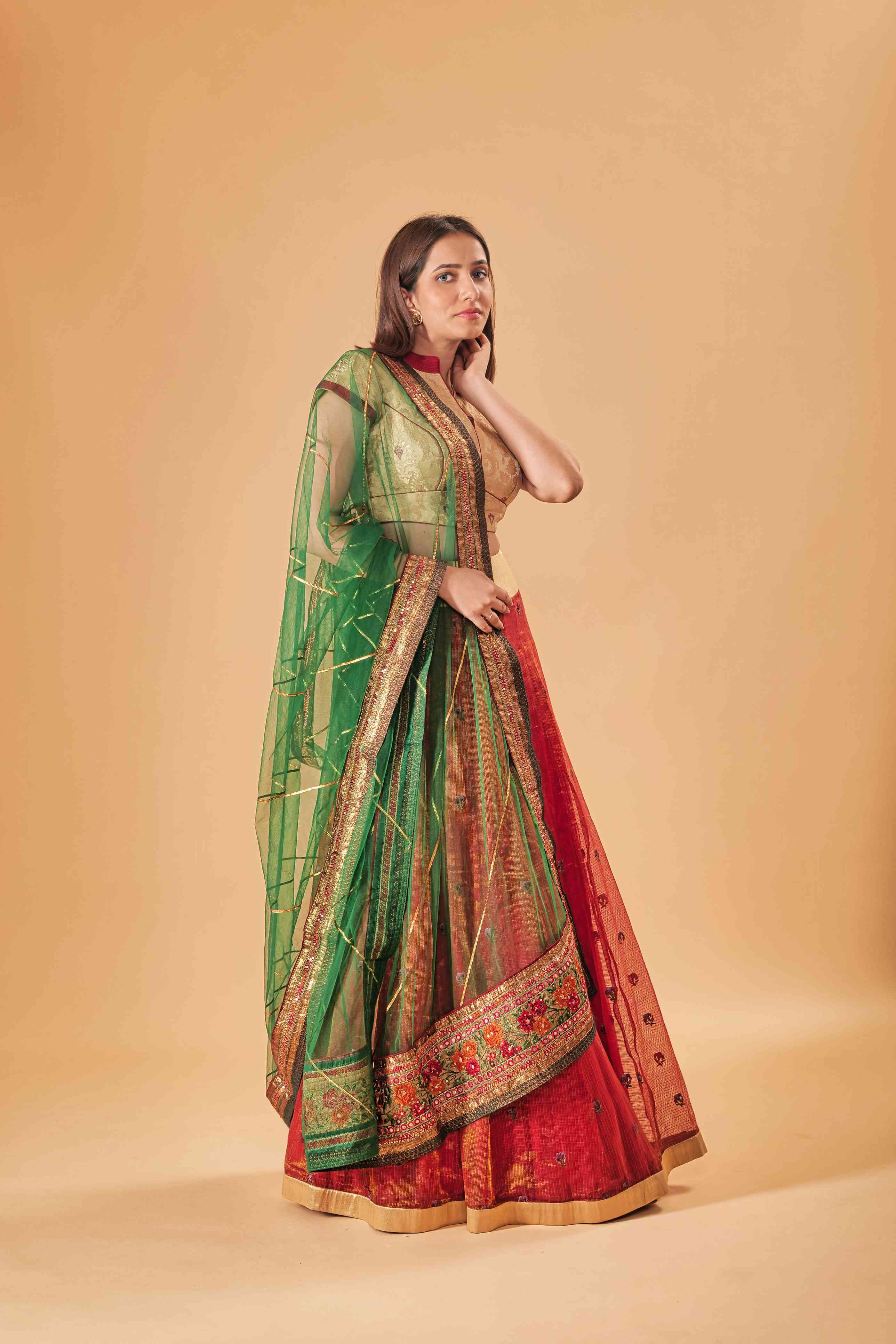 Gold Kin Khaab Indowestern blouse with Tissue silk Parsi work skirt and Soft net Gota and threadwork dupatta