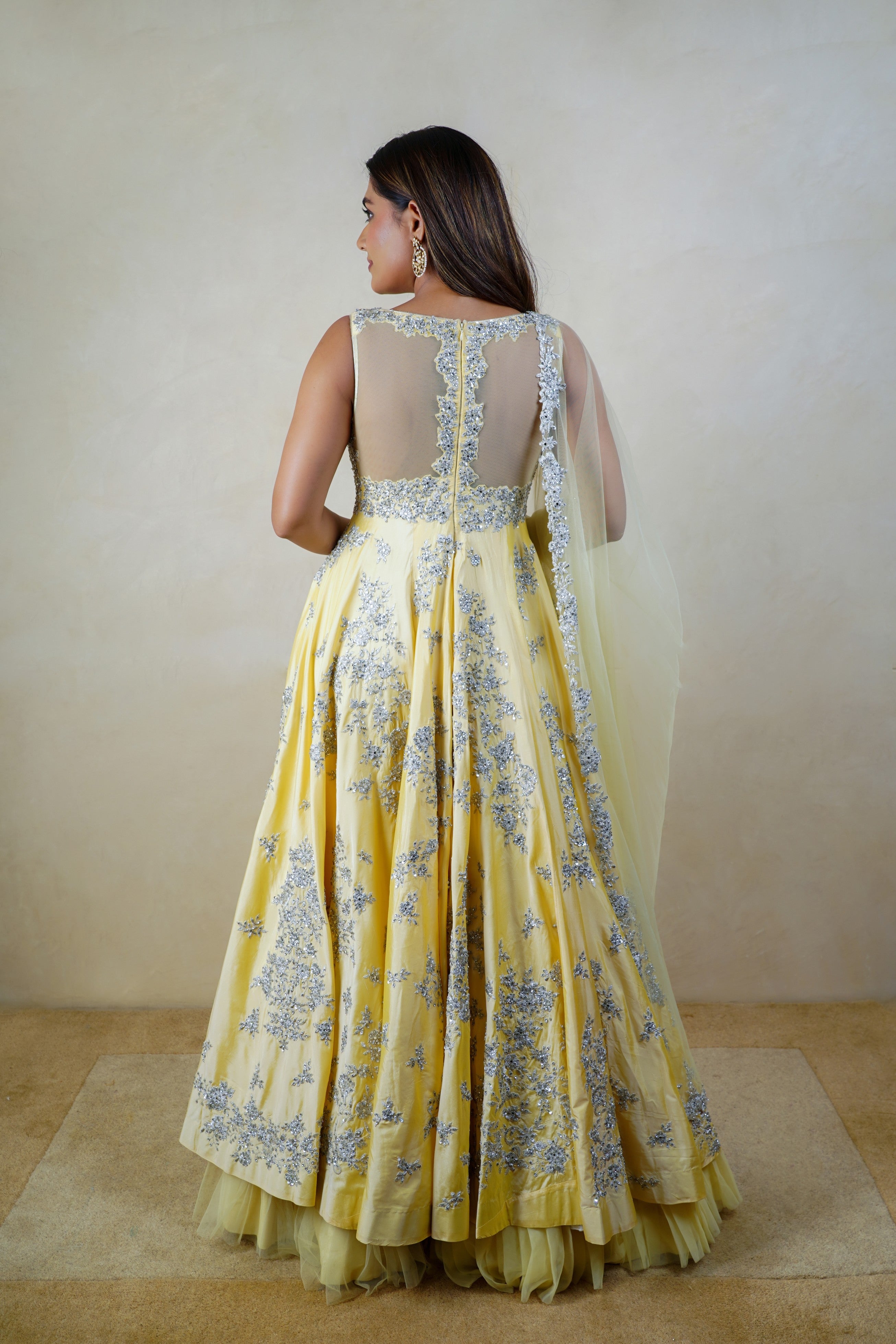 Creamy yellow silk heavy embroidered anarkali suit set