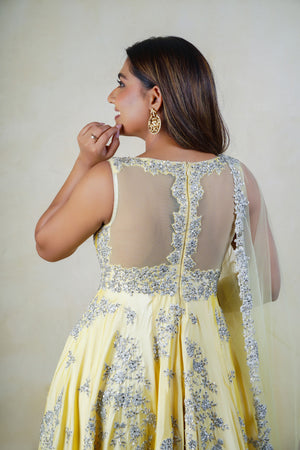 Creamy yellow silk heavy embroidered anarkali suit set