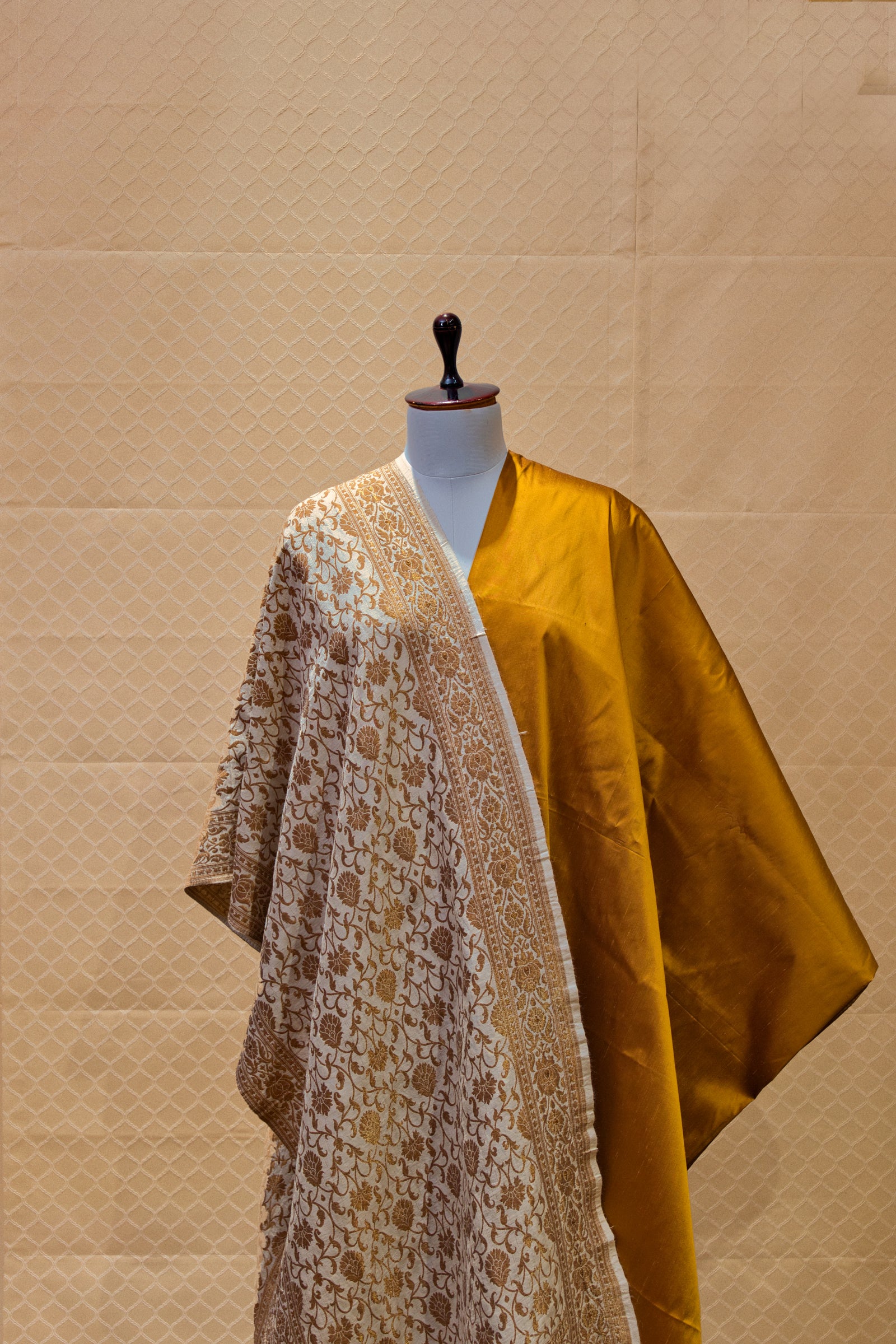 Golden mustard silk suit with antique weave moonga silk stole dupatta