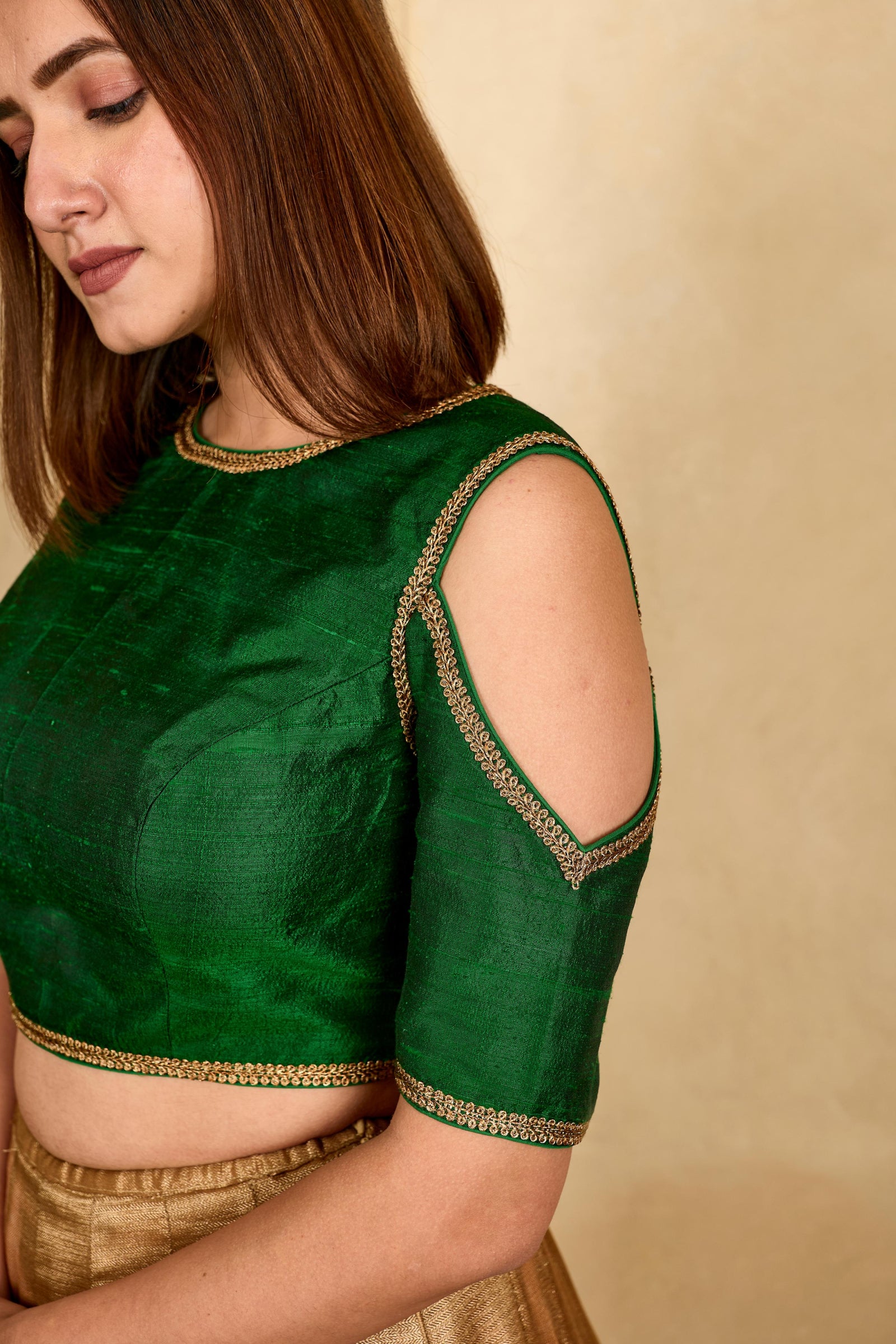 Bottle green cold shoulder silk blouse