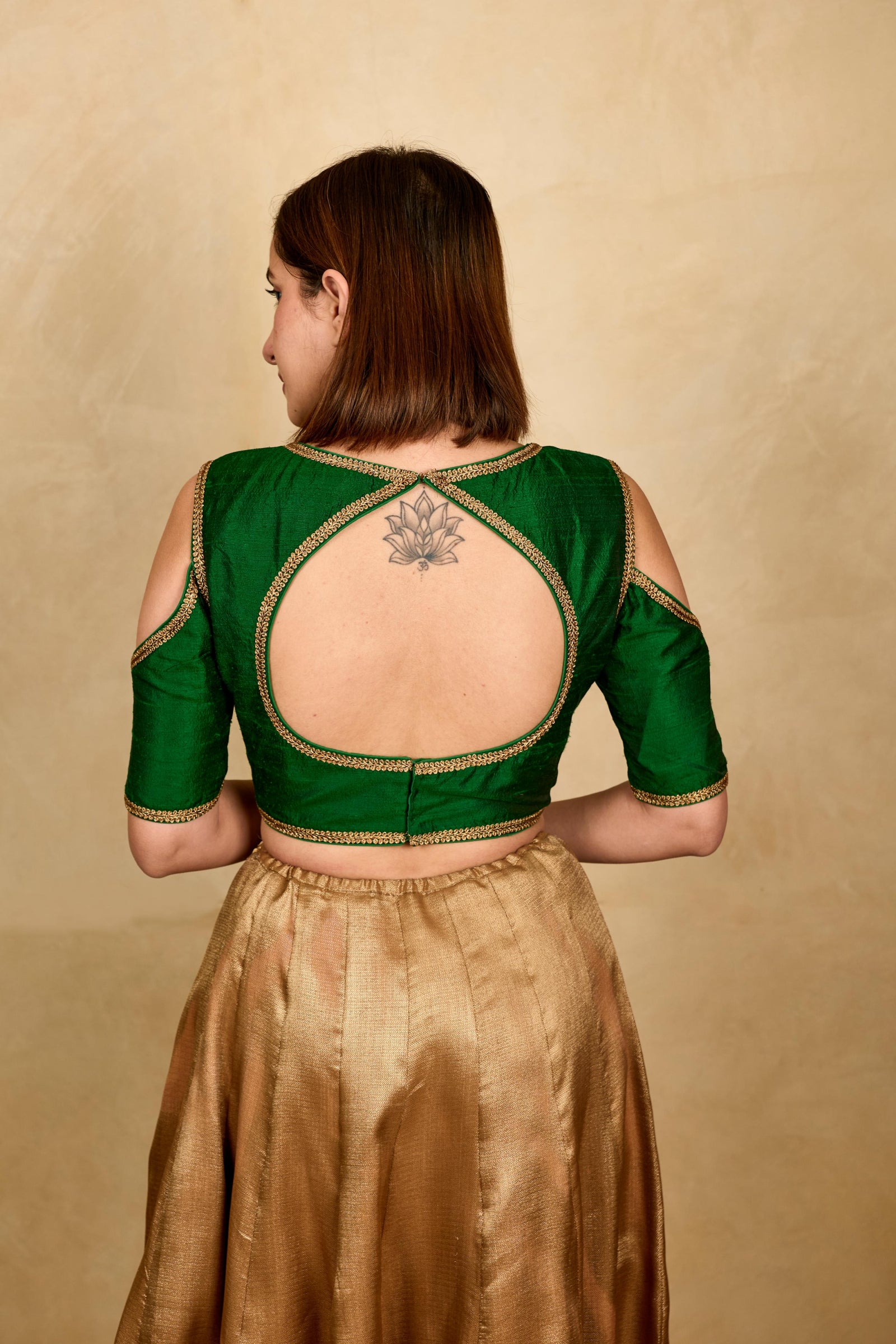 Bottle green cold shoulder silk blouse