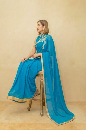 Peacock blue pre draped georgette saree and blouse set