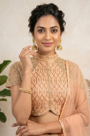 Pastel Peach Silk Lehenga Set with Embroidered High-Neck Choli