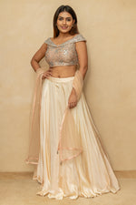 Champagne Peach Satin Silk Lehenga Set with Chunky Mirror-Work Off-Shoulder Blouse