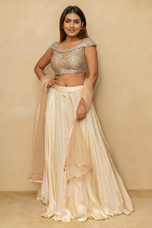 Champagne Peach Satin Silk Lehenga Set with Chunky Mirror-Work Off-Shoulder Blouse