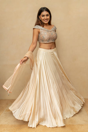 Champagne Peach Satin Silk Lehenga Set with Chunky Mirror-Work Off-Shoulder Blouse