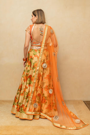 Vibrant Orange Mirror-Work Blouse with Floral Print Silk Lehenga