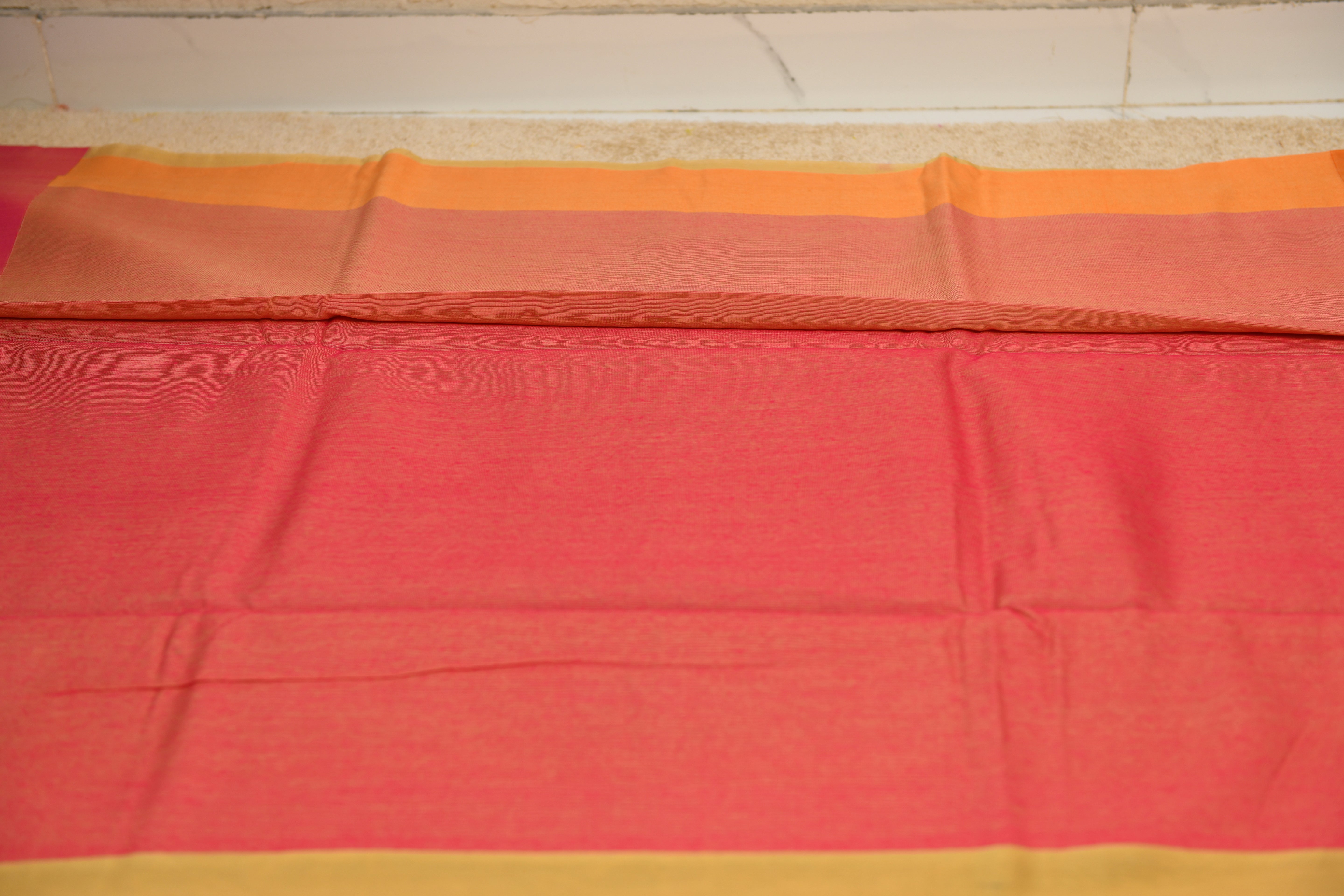 Earthy Olive Handloom Cotton Saree with Vibrant Pink & Orange Border