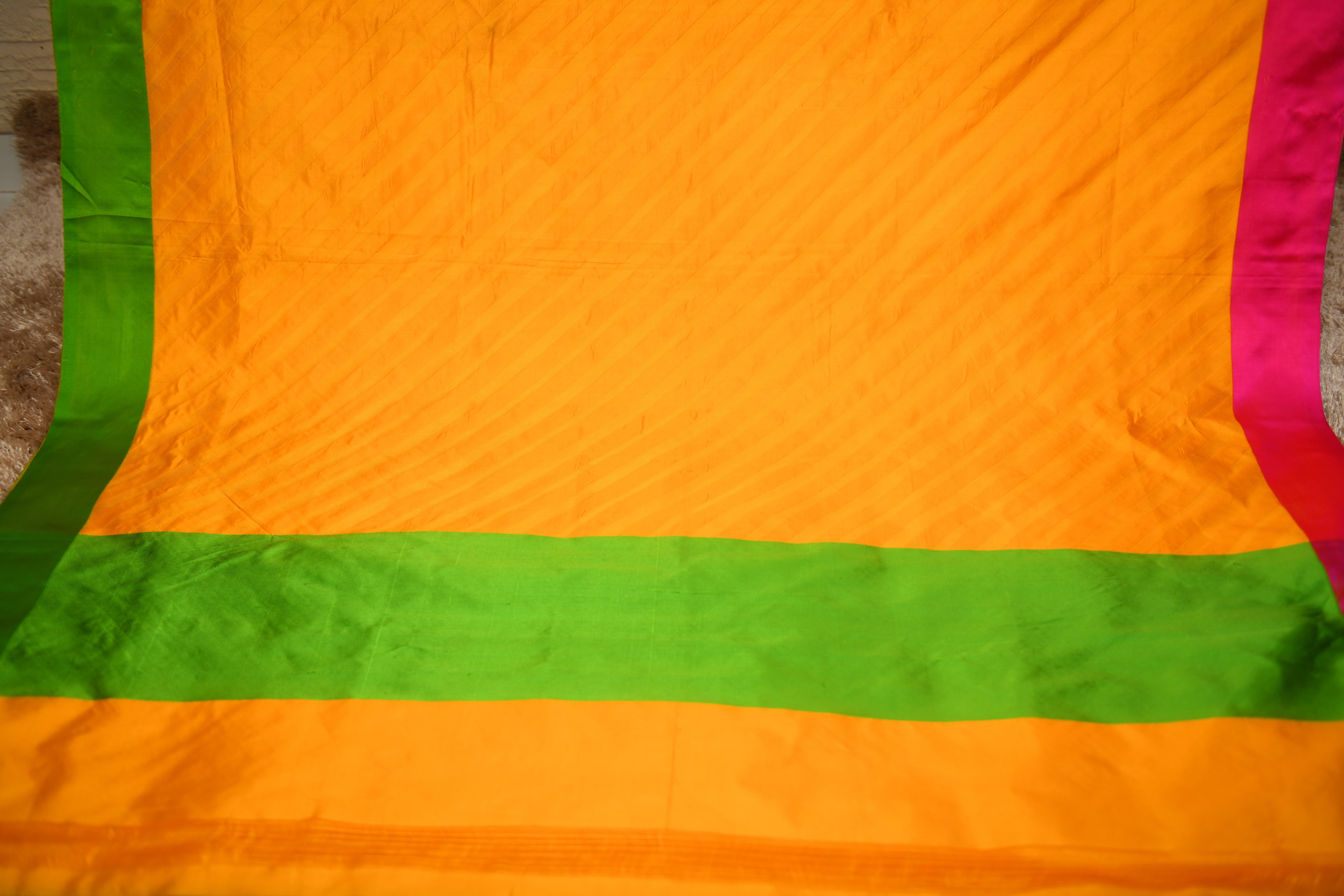 Vibrant Mango Yellow Banarasi Silk Saree with Green & Pink Borders