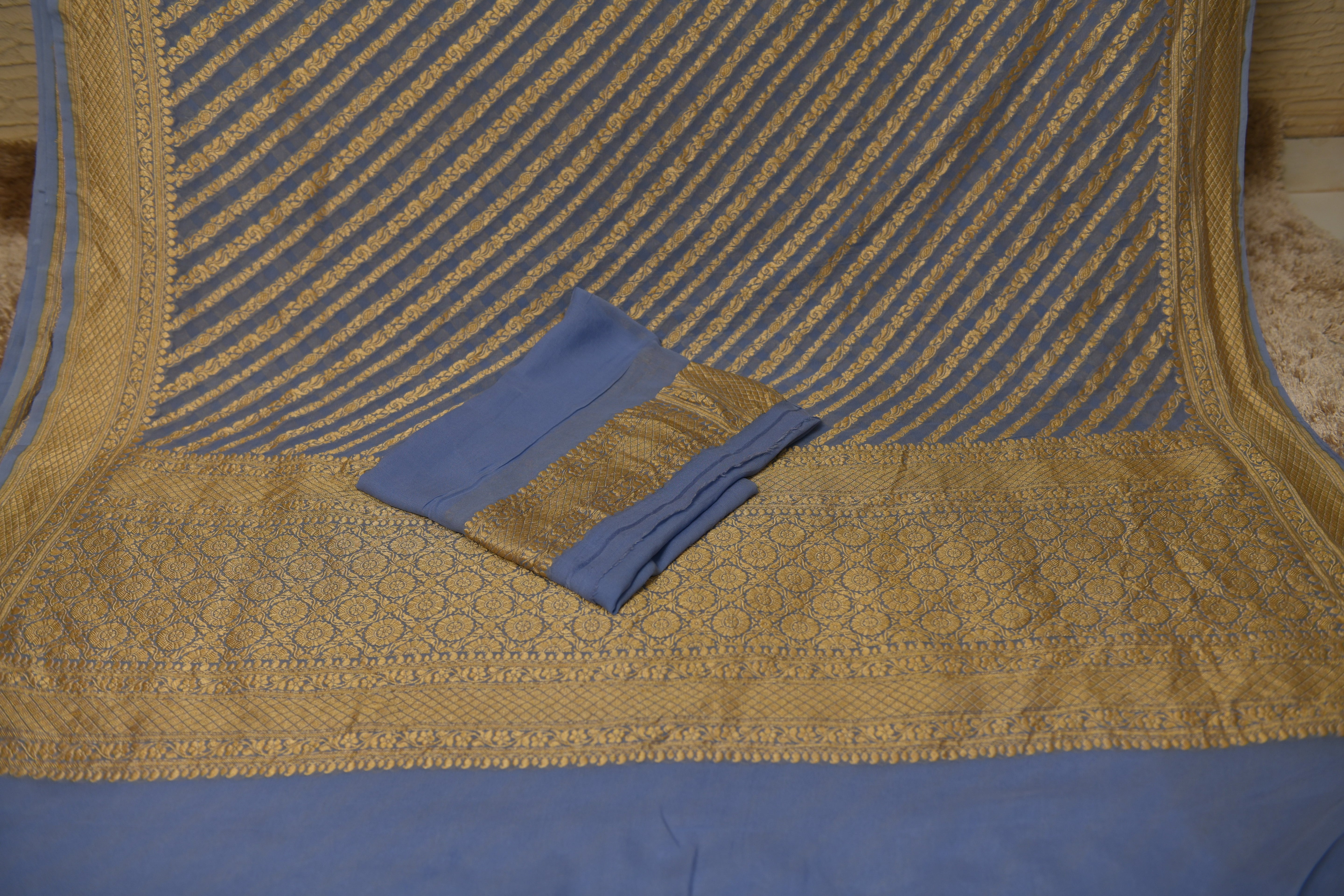 Elegant Powder Blue Leheriya Banarasi Khaddi Georgette Saree