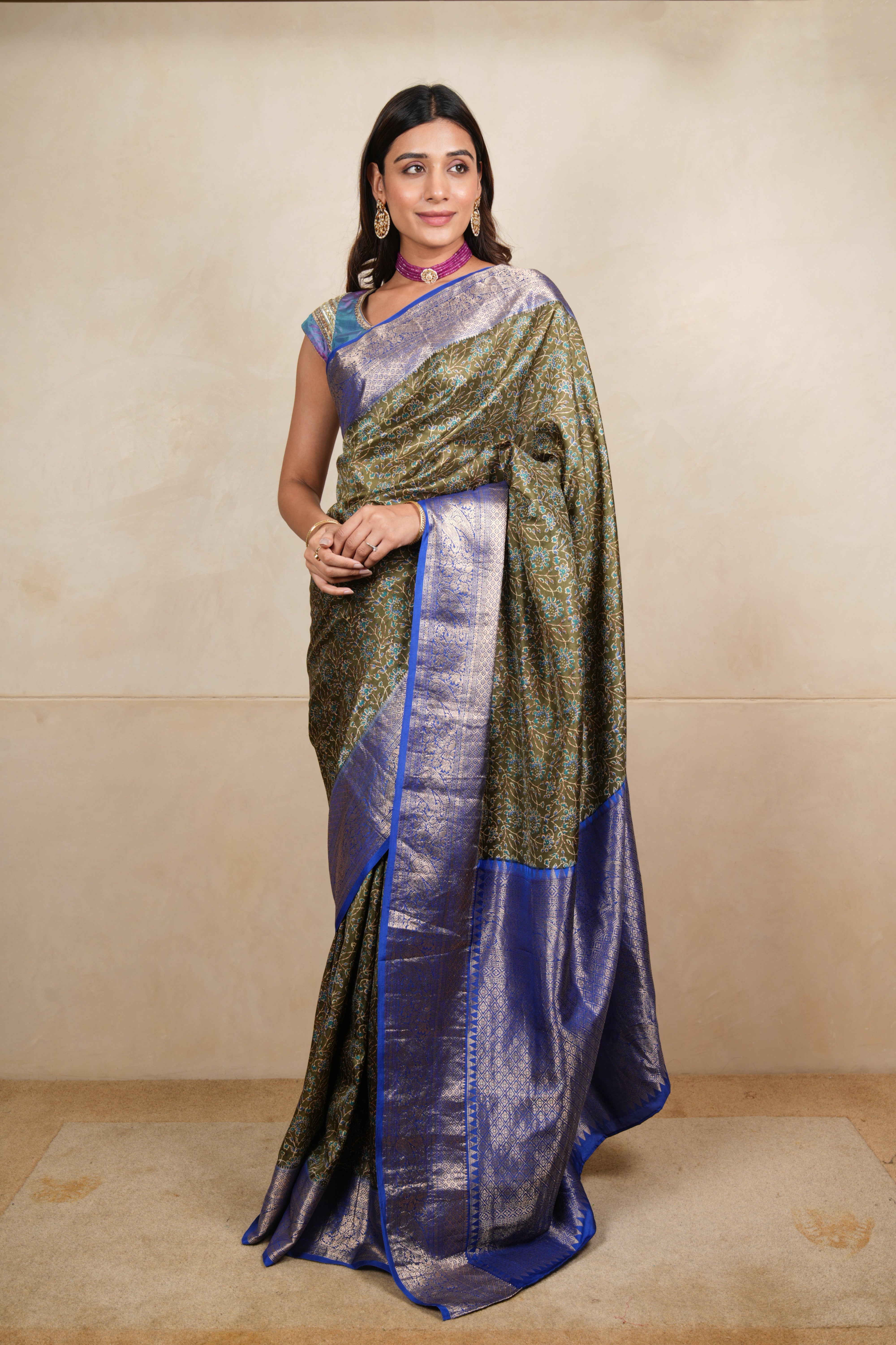 Olive Green Ajrakh Print Soft Silk Saree with Royal Blue Zari Border