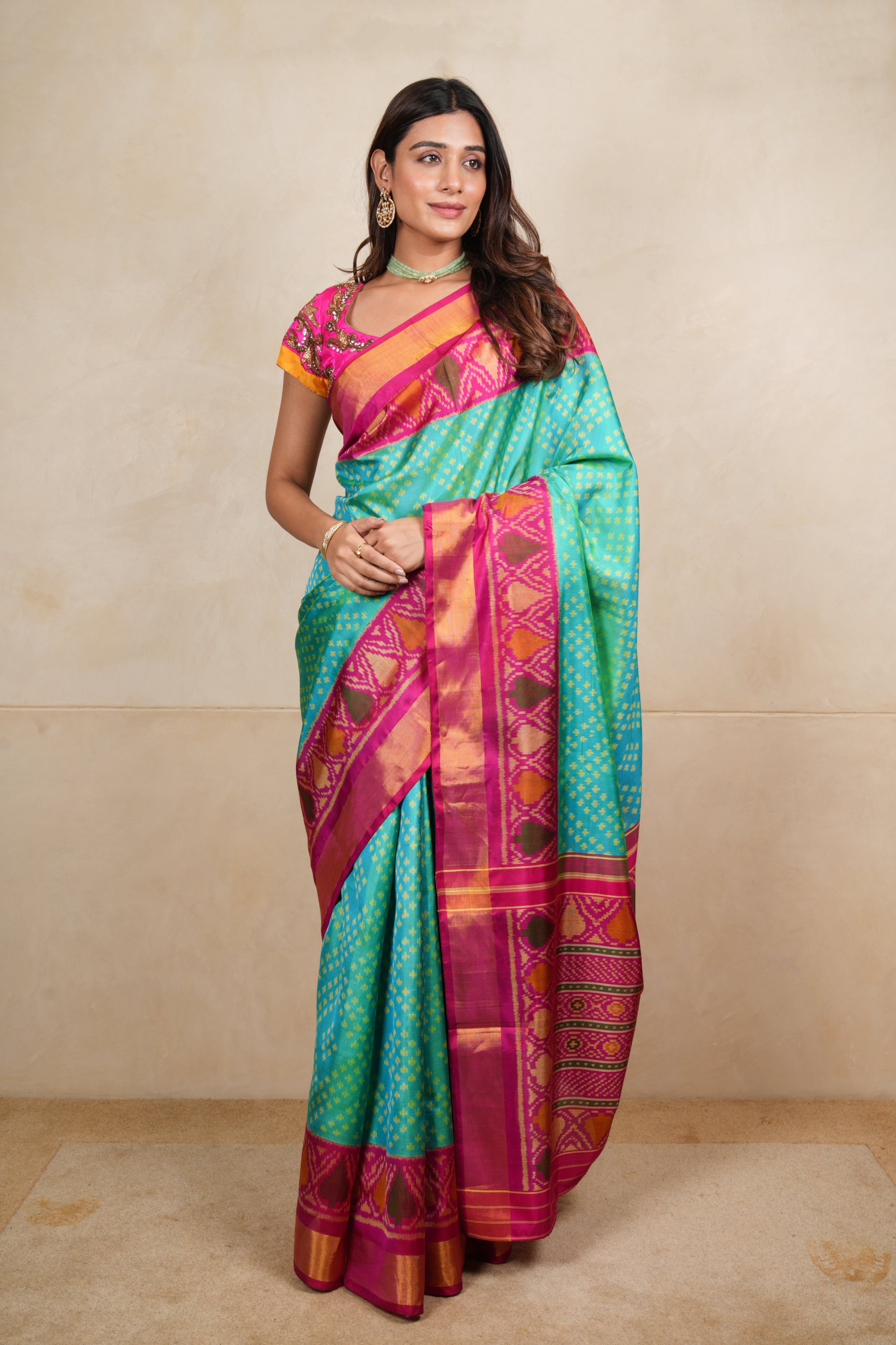 Vibrant Sea Green & Pink Patola Silk Saree