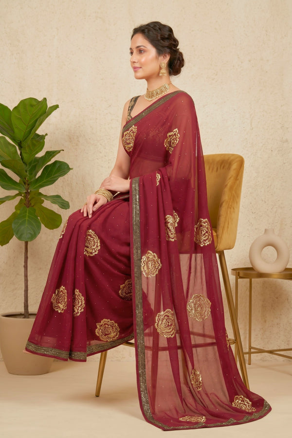 Elegant Maroon Georgette Saree with Golden Floral Motifs